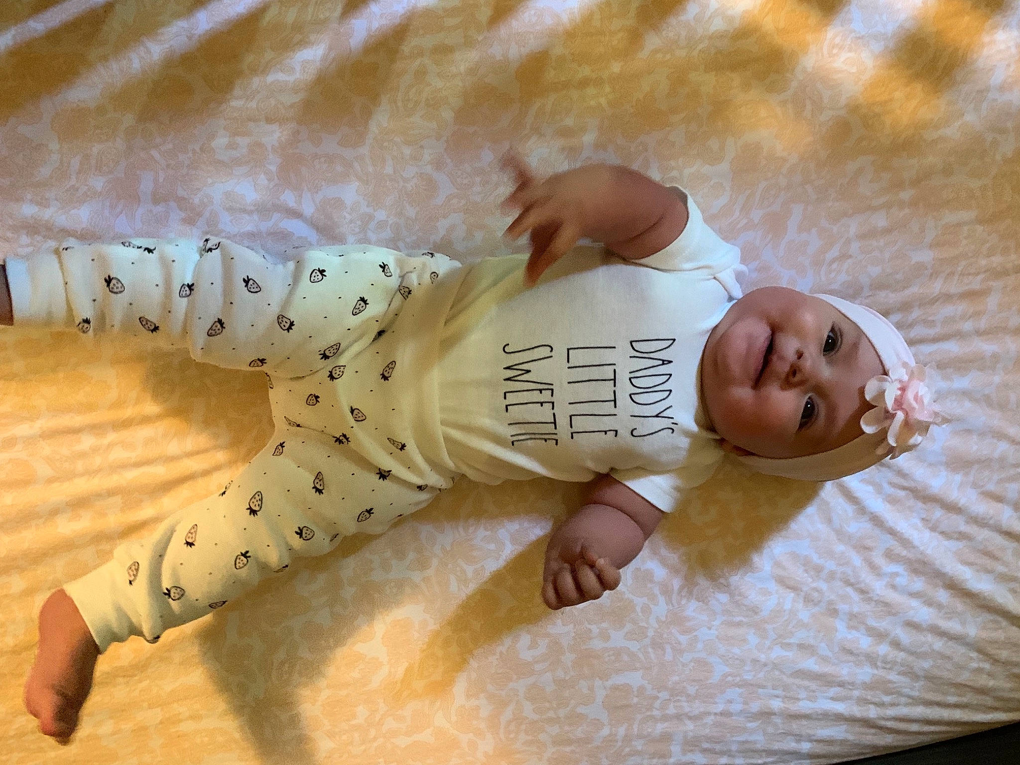 Harper joined the competition — help win amazing prizes! baby, baby_toddler_clothing, child, comfort, floor, flooring, foot, fun, happy, hardwood, headwear, human_body, human_leg, joy, leg, mammal, person, sitting, sleeve, smile