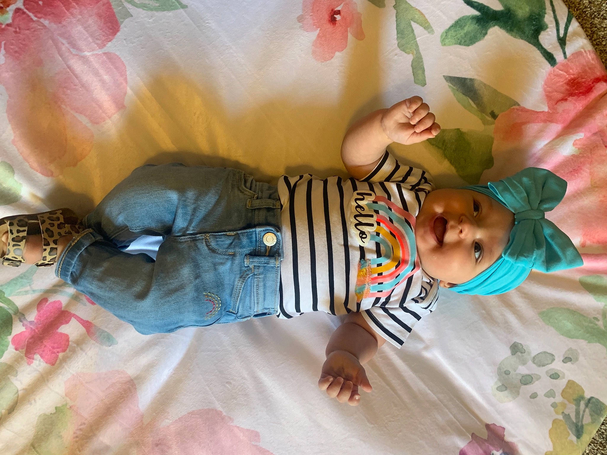 Harper is registered to the contest to win money with this photo: baby, child, fun, grass, happy, headwear, human_body, leaf, leisure, linens, pattern, people_in_nature, person, pink, room, skin, summer, textile, toddler, tree