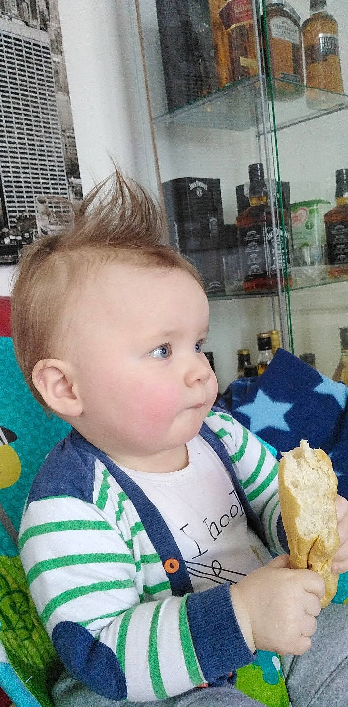 Dorian is registered to the contest to win money with this photo: baby, cheek, child, eating, person, toddler