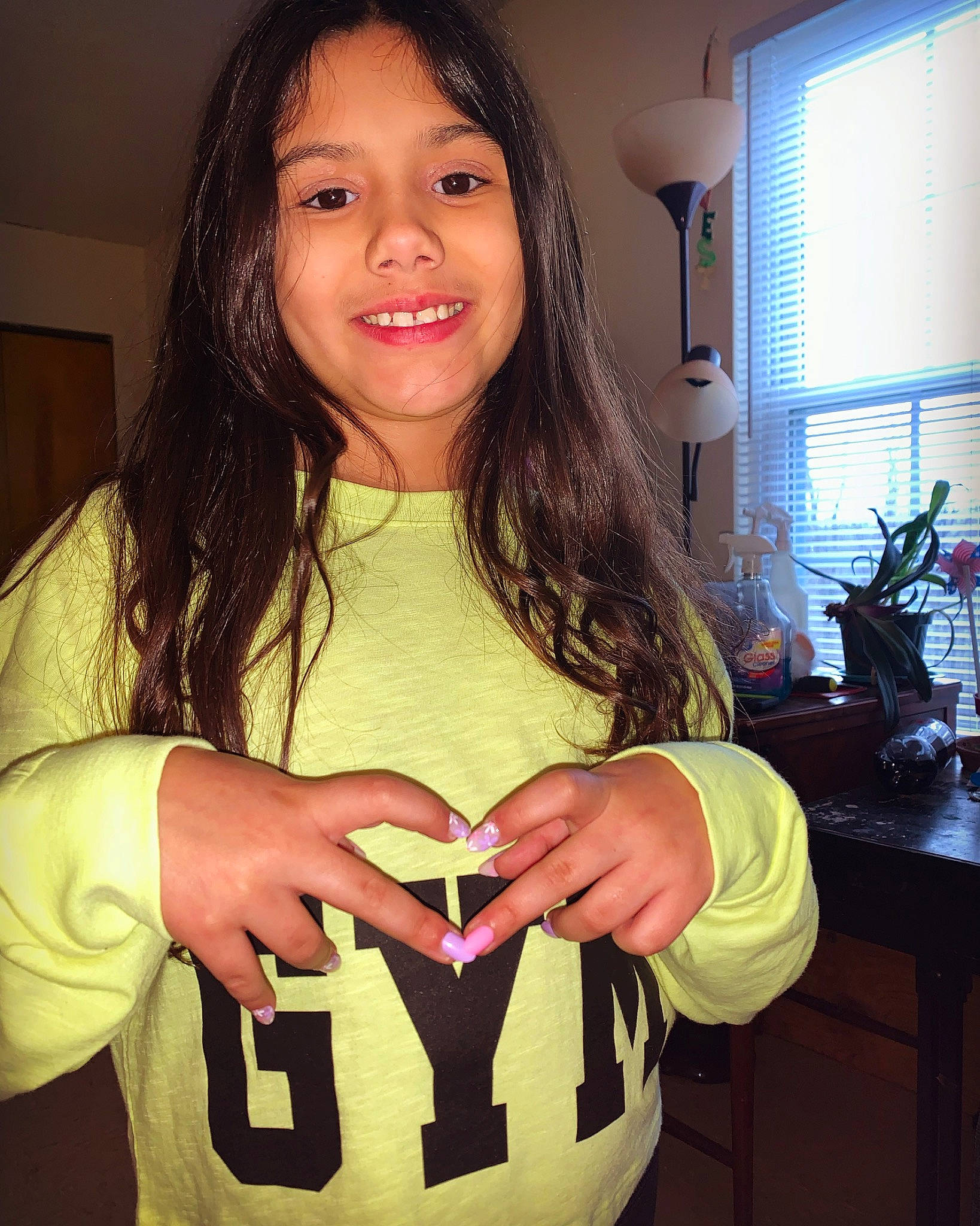 Ashlynn joined the competition — help win amazing prizes! arm, chest, eye, finger, gesture, hair, hand, happy, head, houseplant, joy, long_hair, neck, person, plant, sleeve, smile, t_shirt, thumb, trunk