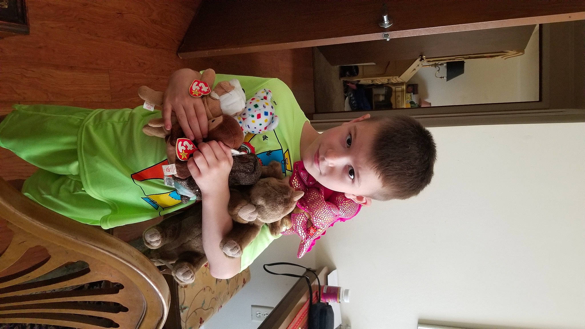 Christian is registered to the contest to win money with this photo: automotive_tire, baby, baby_products, baby_toddler_clothing, cabinetry, chair, child, countertop, fun, happy, home_appliance, house, joy, kitchen_appliance, person, play, refrigerator, room, sitting, toddler