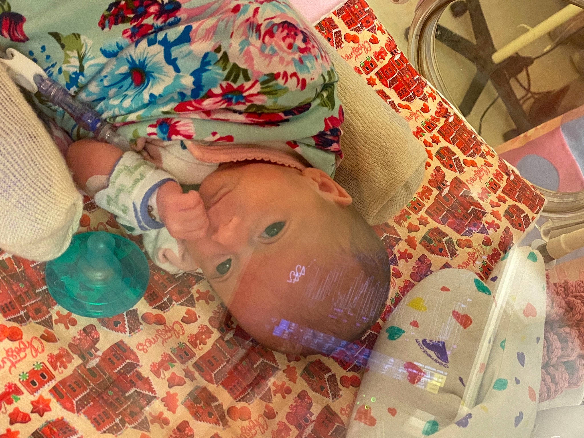 Novah is registered to the contest to win money with this photo: abdomen, baby, baby_products, bedding, bedtime, child, comfort, event, flesh, flooring, foot, hospital, human_leg, linens, mouth, nail, pattern, person, room, thigh