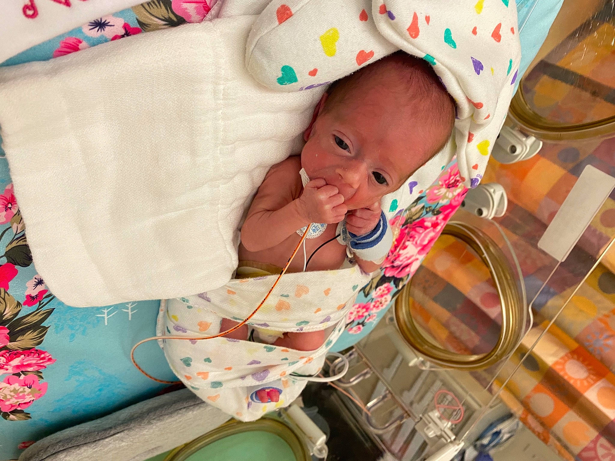 Novah joined the competition — help win amazing prizes! baby, baby_carriage, baby_products, baby_safety, baby_toddler_clothing, cheek, child, comfort, eyewear, fashion_accessory, fun, happy, hat, linens, pattern, person, personal_protective_equipment, room, sitting, textile