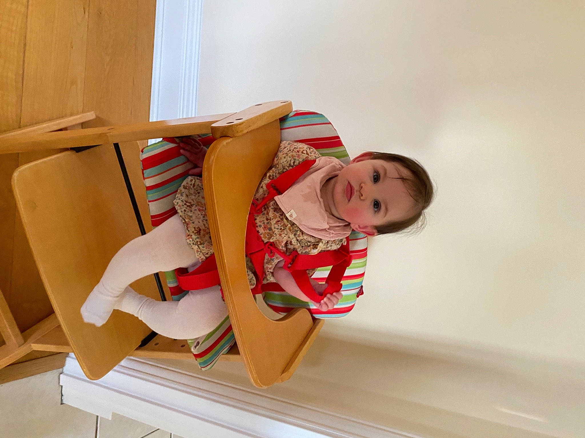 Julie joined the competition — help win amazing prizes! baby, baby_products, carmine, chair, comfort, elbow, fashion_design, flooring, foot, human_leg, knee, paper_product, pattern, person, room, sandal, sitting, stairs, thigh, toddler