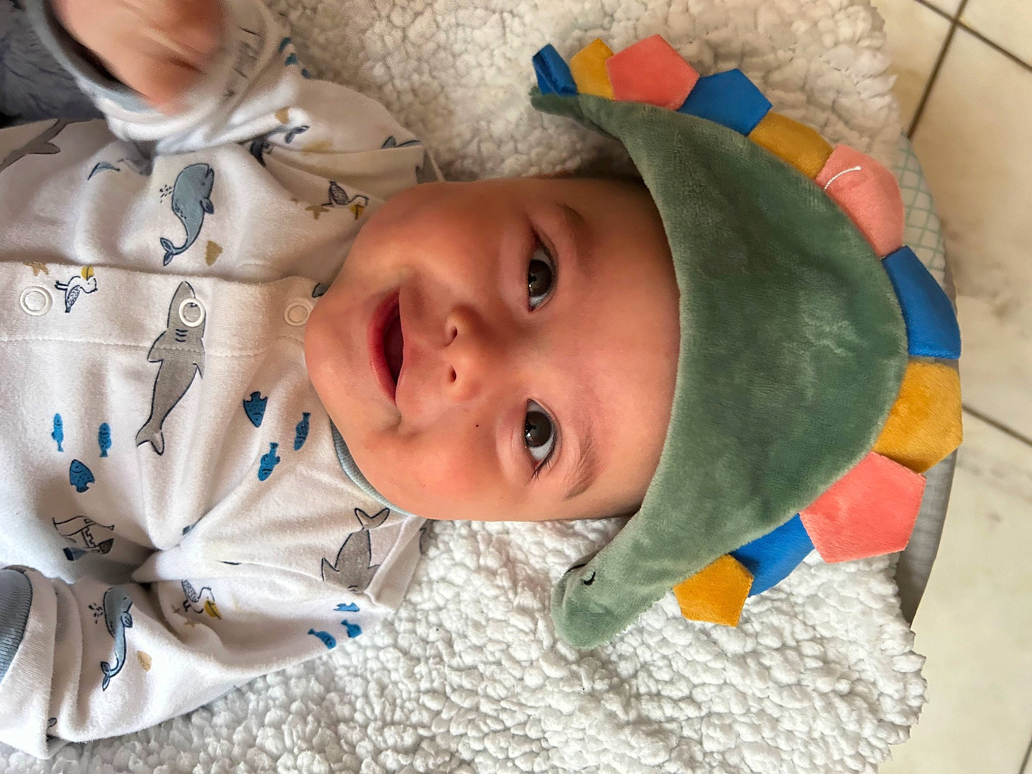 Sean Andrés joined the competition — help win amazing prizes! baby, baby_toddler_clothing, cap, cheek, child, clothing, facial_expression, happy, head, headwear, iris, joy, linens, nose, people, person, product, skin, sleeve, smile