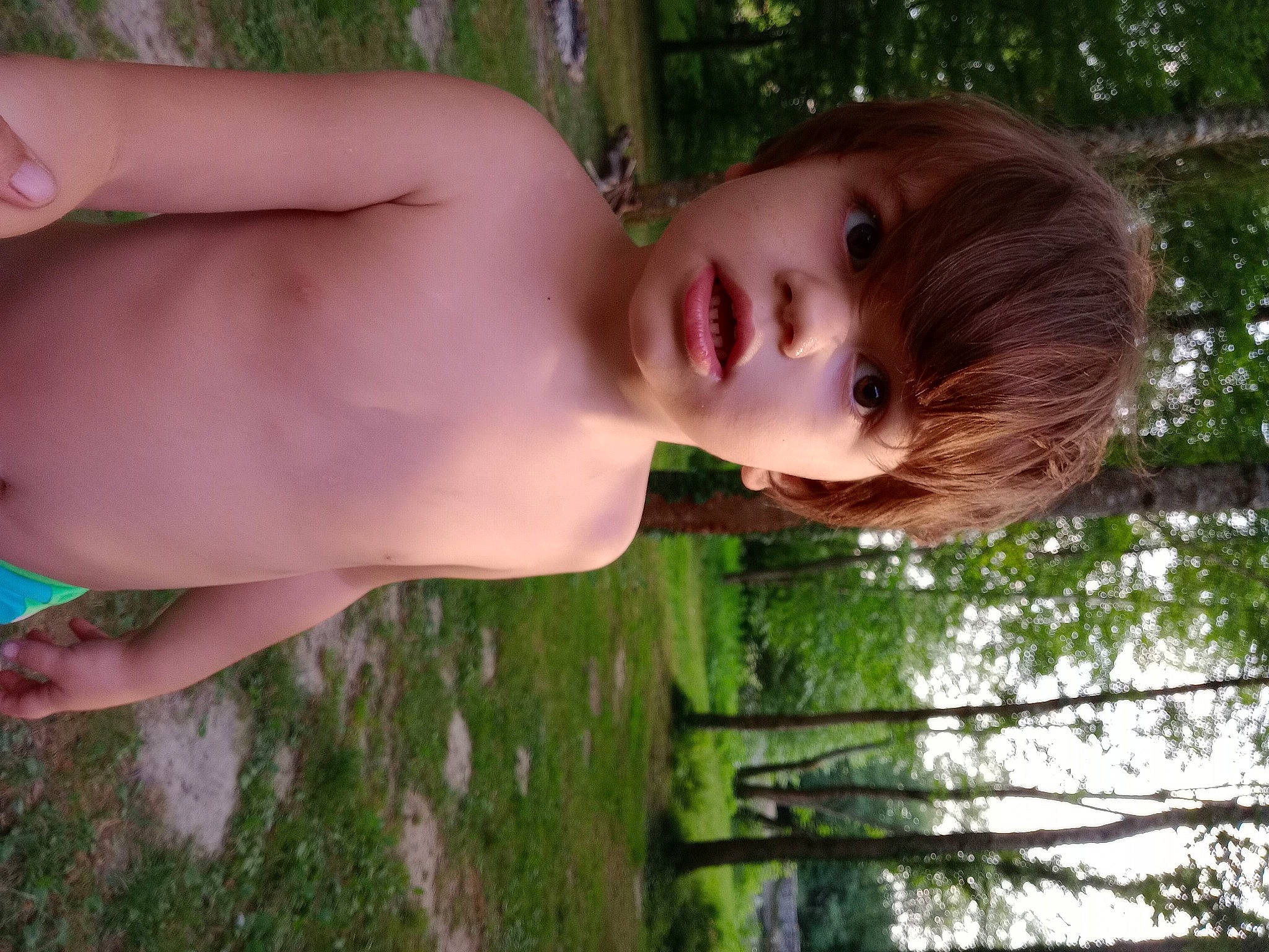 Kévin participe au concours pour gagner de l'argent avec cette photo : beauty, black_hair, chest, fun, grass, grass_family, happy, lip, nose, people_in_nature, person, plant, skin, sky, summer, sunlight, toddler, tree, trunk, water
