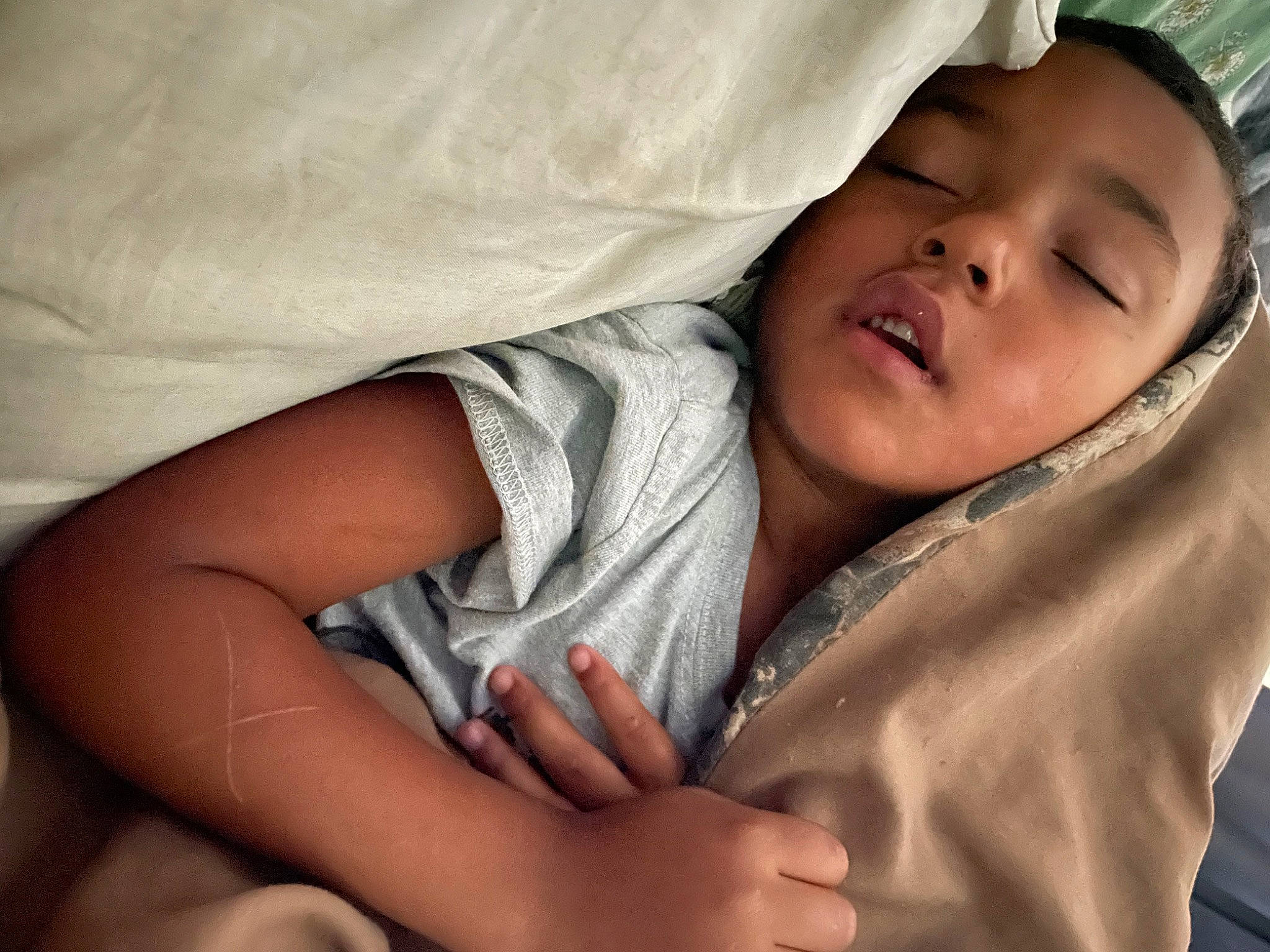 Corbin is registered to the contest to win money with this photo: baby, cheek, child, close_up, comfort, elbow, eyebrow, eyelash, finger, gesture, happy, iris, lip, mouth, muscle, nose, person, skin, smile, textile