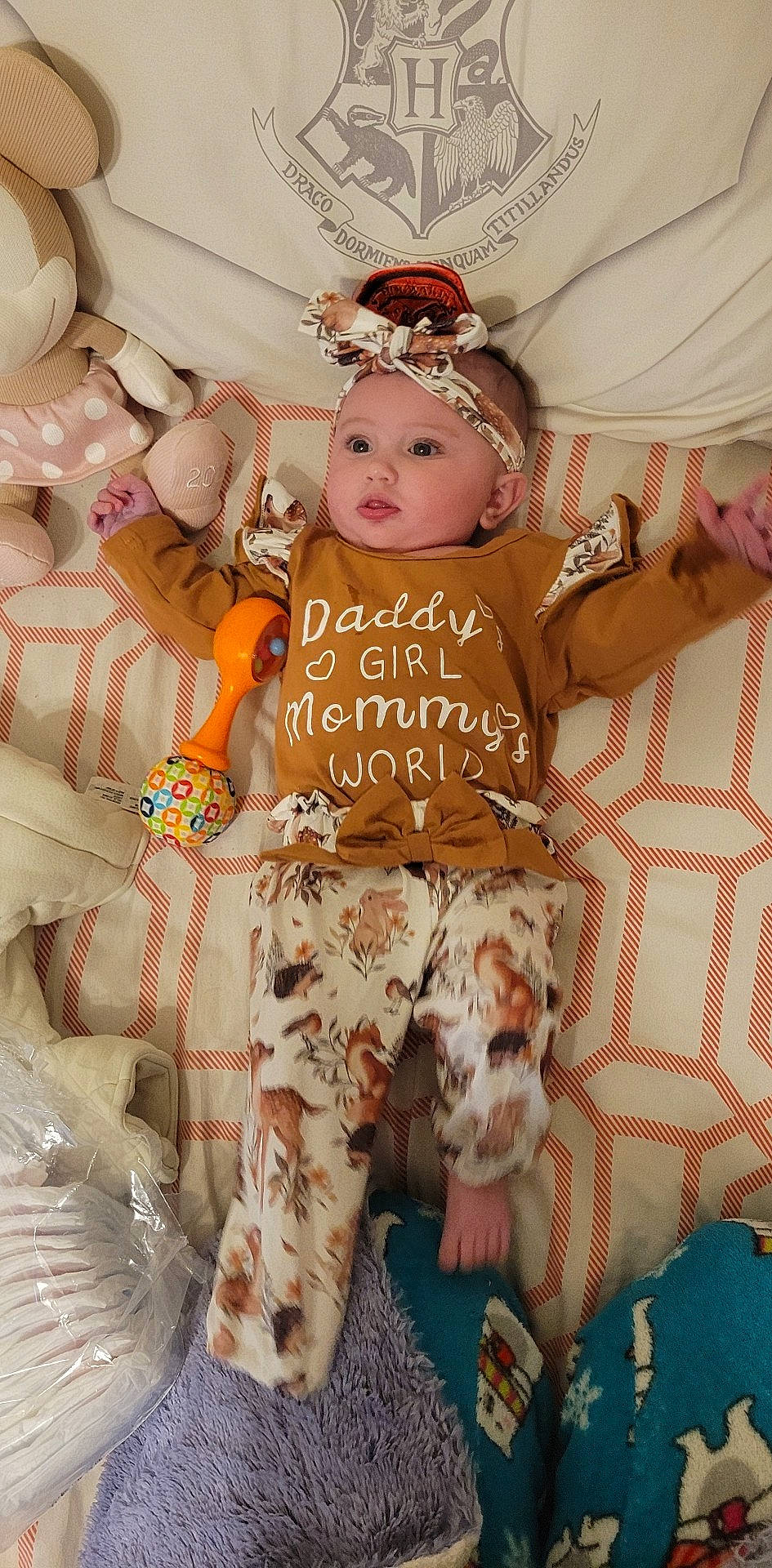 Hayleigh joined the competition — help win amazing prizes! baby, baby_toddler_clothing, brown_hair, child, doll, eyelash, fashion_accessory, fawn, fun, happy, hat, headband, headpiece, headwear, orange, party_supply, pattern, peach, person, pink