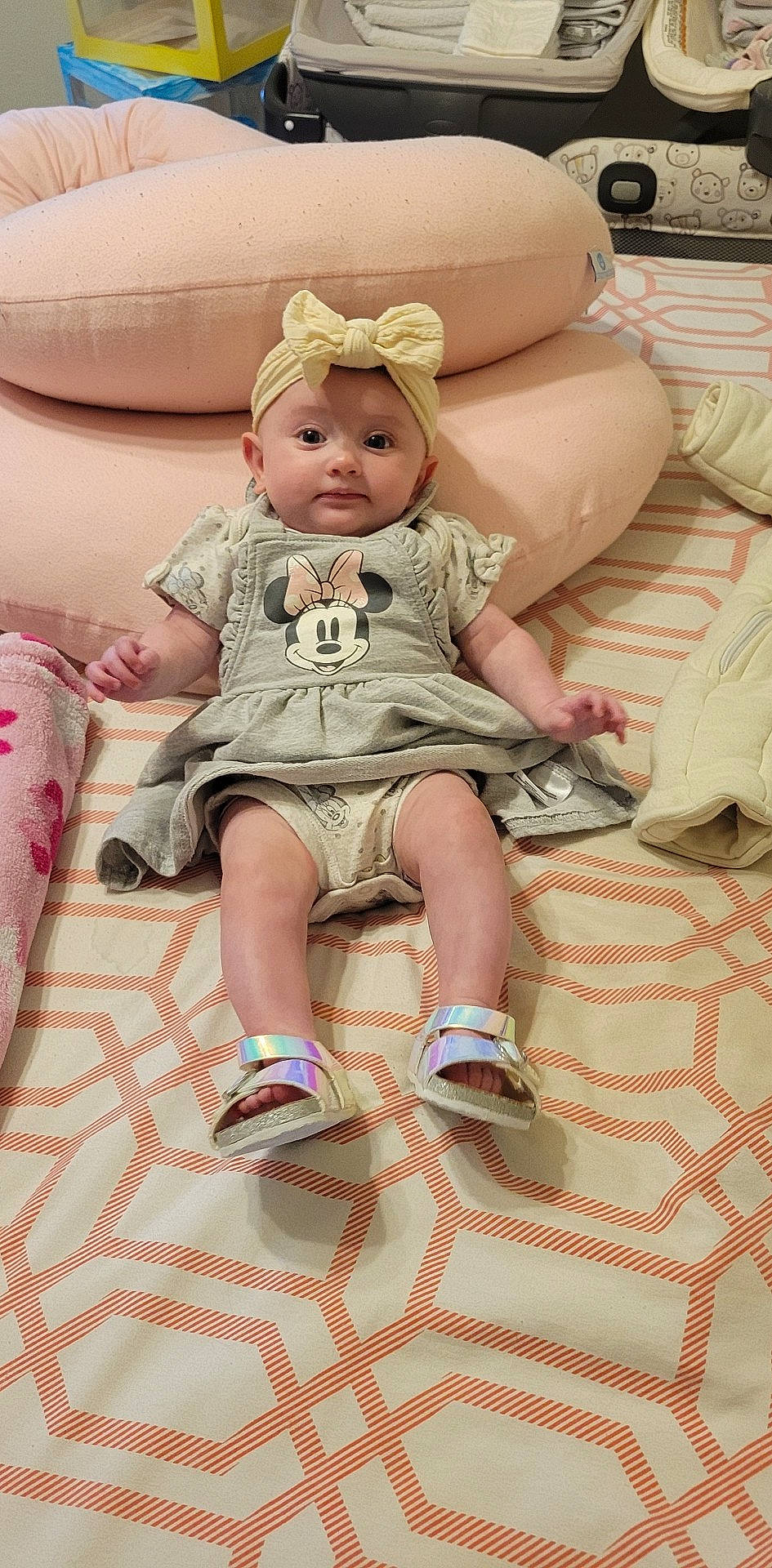 Hayleigh joined the competition — help win amazing prizes! baby, baby_toddler_clothing, child, comfort, couch, fashion_accessory, happy, headwear, human_leg, lap, leg, pattern, person, pink, sandal, shoe, sitting, skin, sleeve, smile