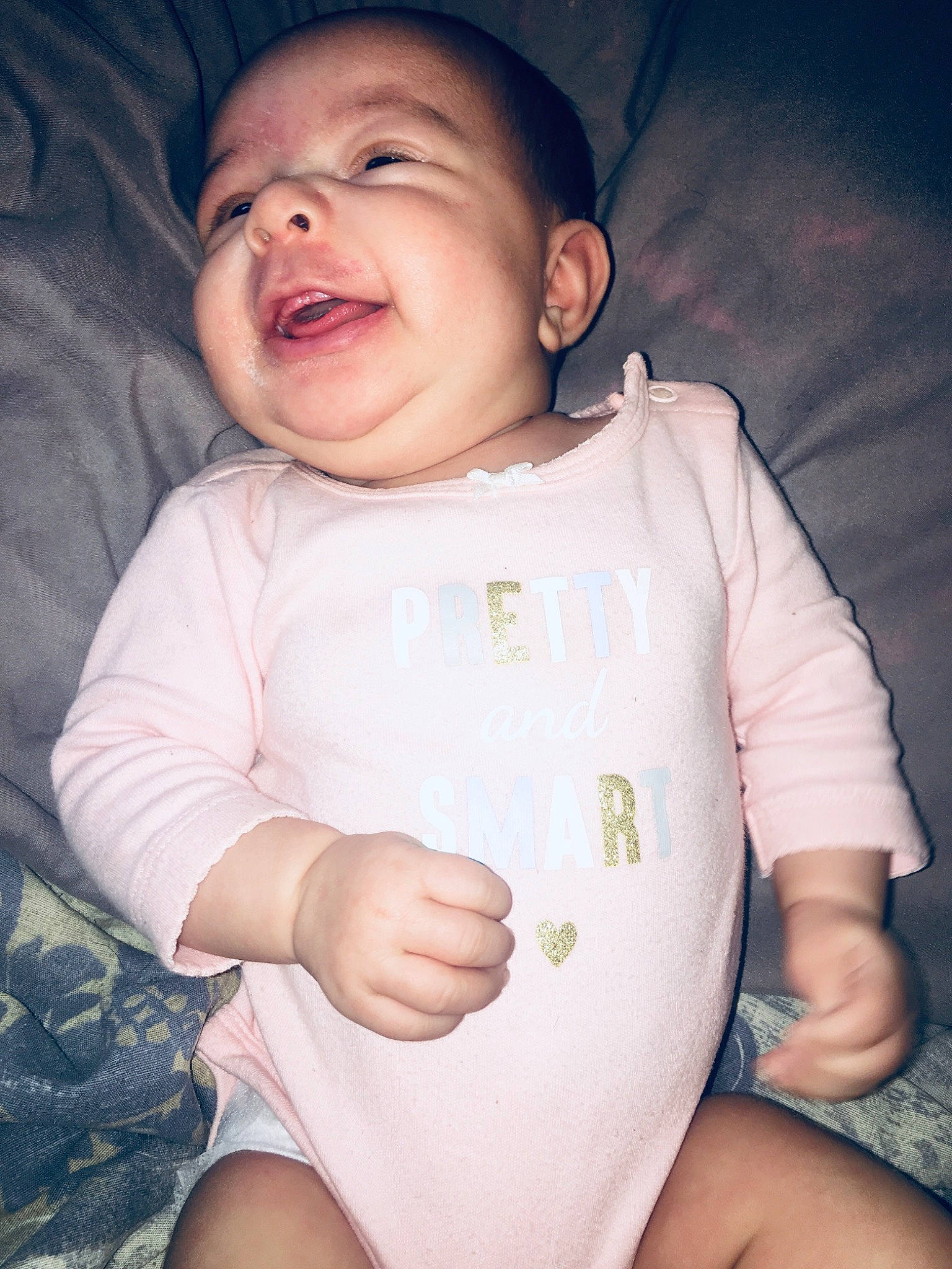 Macii is registered to the contest to win money with this photo: baby, baby_products, baby_toddler_clothing, cheek, child, comfort, finger, hand, human, laugh, person, product, skin, toddler, tongue, tooth