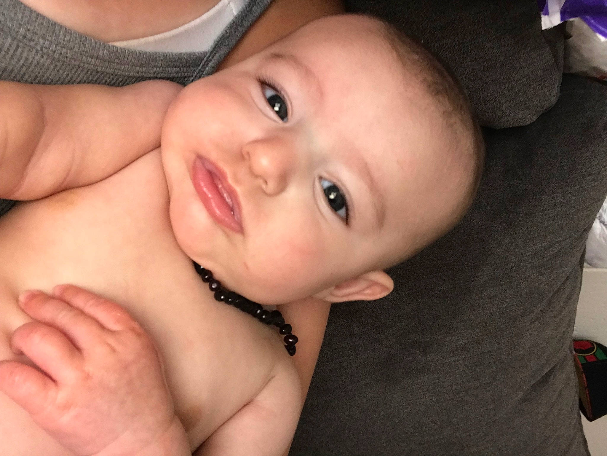 Mia Grace is registered to the contest to win money with this photo: baby, cheek, chin, eye, eyebrow, eyelash, face, finger, flash_photography, gesture, happy, jaw, lip, mouth, muscle, neck, nose, person, skin, smile