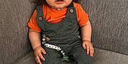 Nolan joined the competition — help win amazing prizes! baby, baseballcap, cap, clothing, couch, cushion, face, furniture, hat, head, homedecor, hosiery, jeans, pants, person, photography, portrait, sitting, sleeve, sock