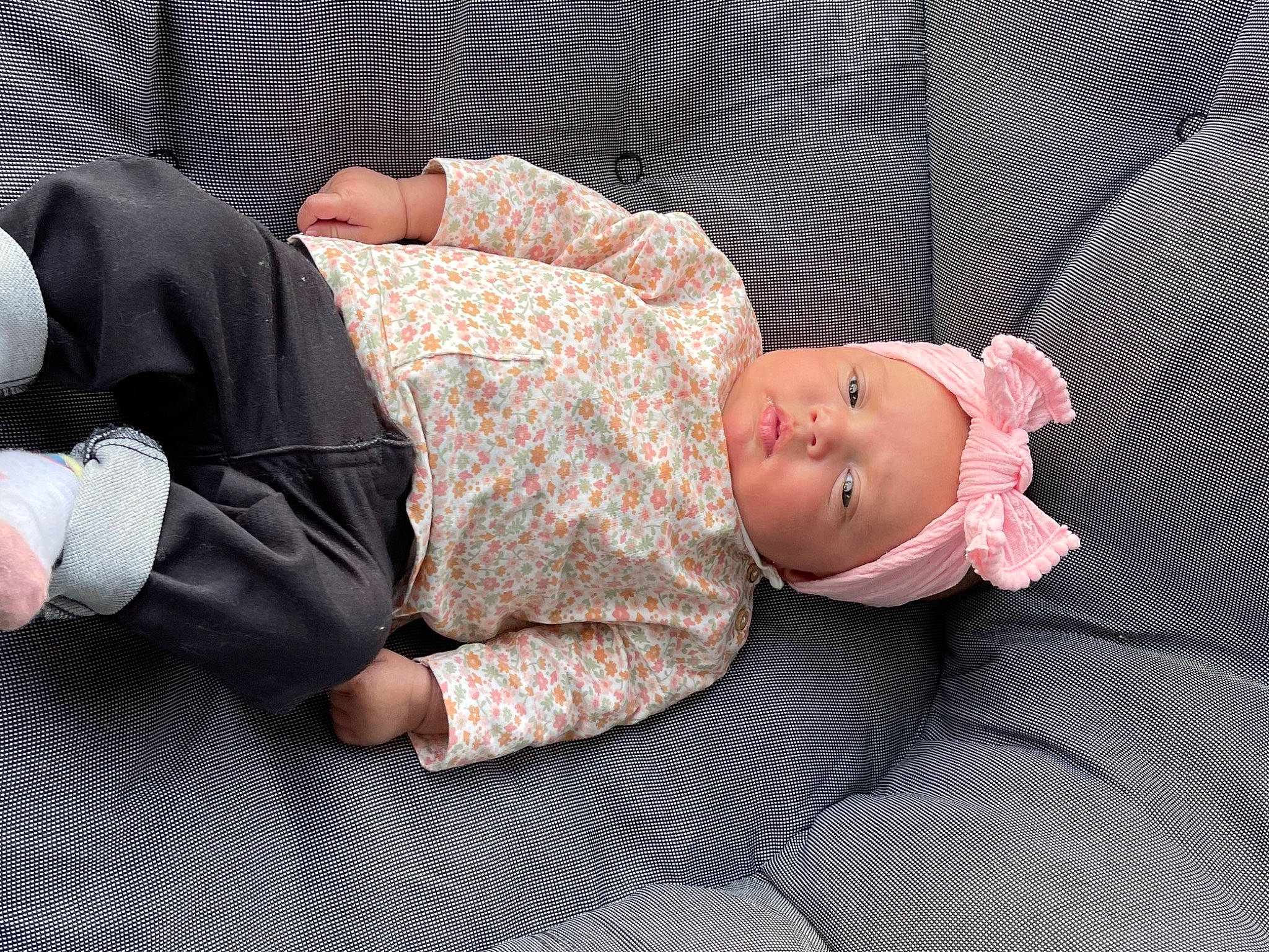 Flora participe au concours pour gagner de l'argent avec cette photo : baby, baby_products, baby_sleeping, baby_toddler_clothing, child, comfort, flooring, glasses, headwear, human_body, linens, nap, pattern, person, room, sitting, sleep, sleeve, sock, textile