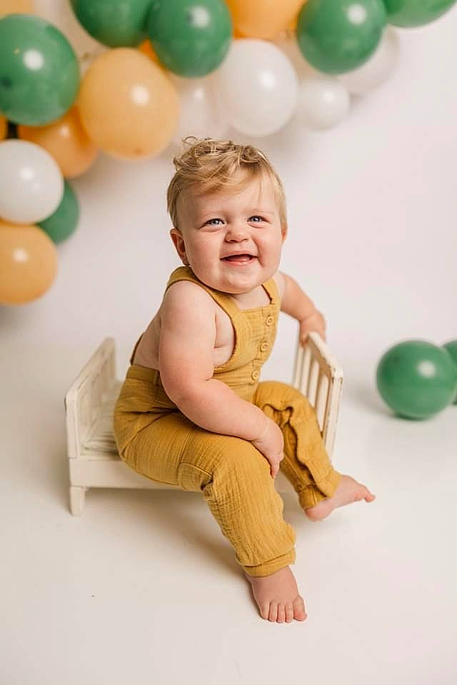Oliver Finn joined the competition — help win amazing prizes! baby, baby_playing_with_toys, baby_toddler_clothing, balloon, barefoot, child, event, facial_expression, fun, happy, joy, leisure, party, party_supply, person, play, room, sitting, sleeve, smile