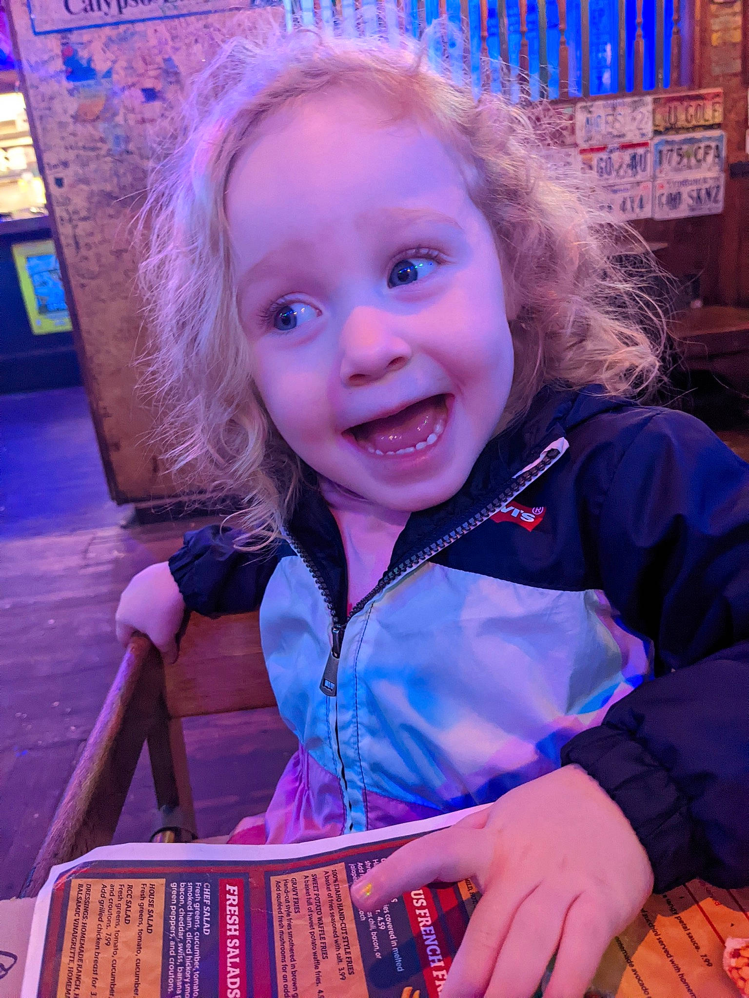 Bella is registered to the contest to win money with this photo: blue, child, electric_blue, fashion, folk_instrument, fun, happy, iris, magenta, musical_instrument, organ, people, person, photograph, pink, purple, skin, smile, standing, toddler