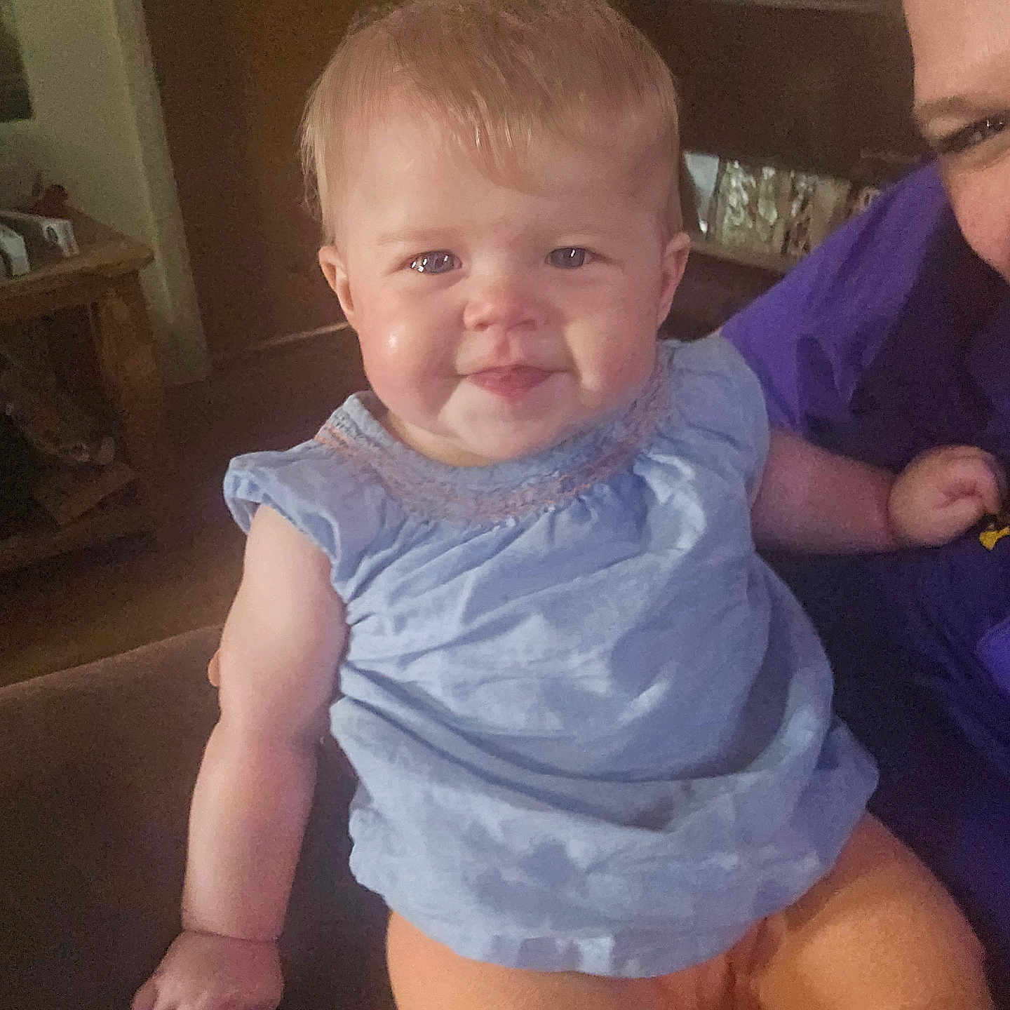 Skylar is registered to the contest to win money with this photo: baby, bodypart, clothing, couch, face, frown, furniture, happy, head, indoors, laughing, mouth, pants, person, photography, portrait, sitting, smile, t_shirt, teeth