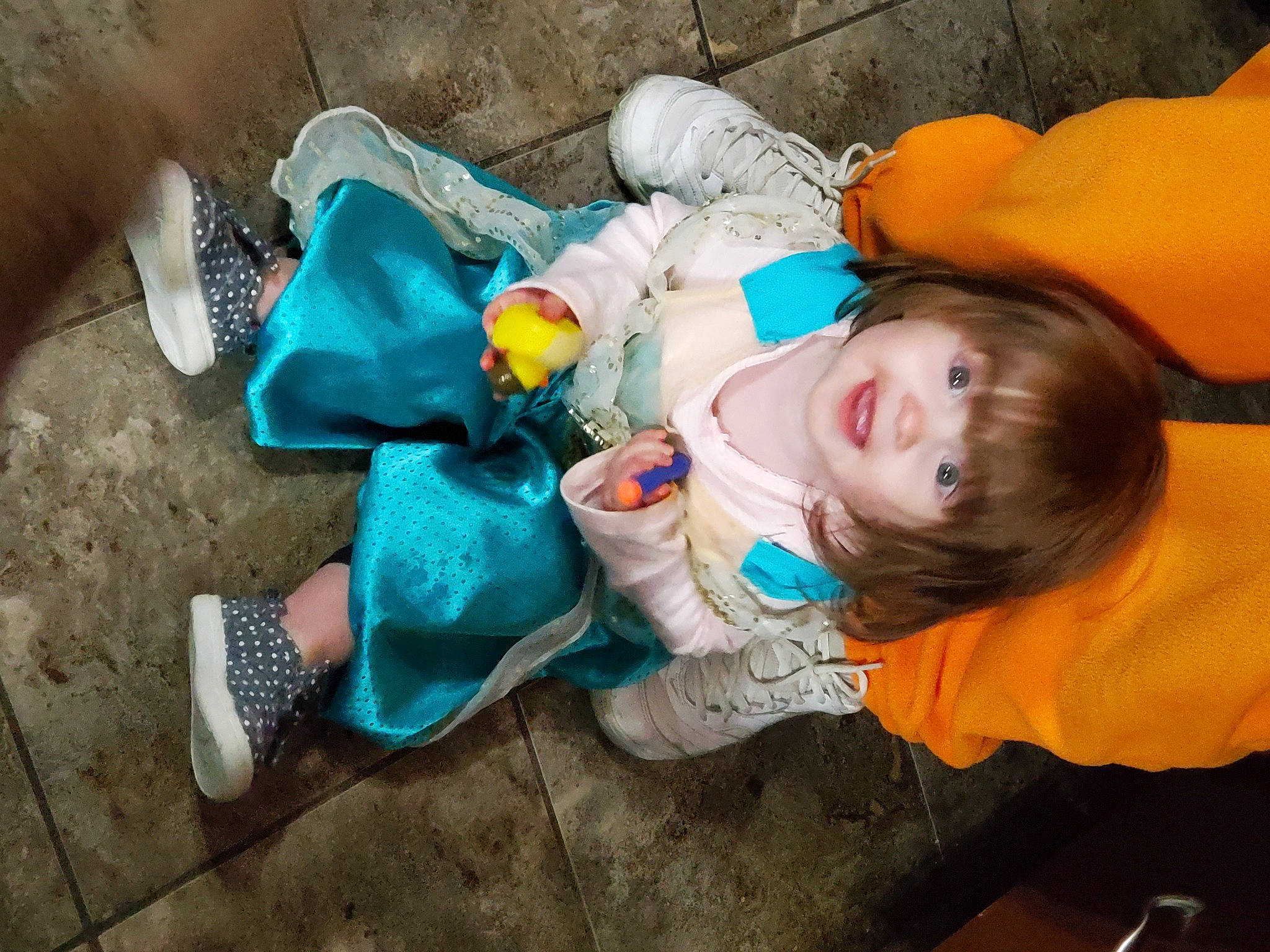 Daniella is registered to the contest to win money with this photo: baby, baby_toddler_clothing, child, comfort, flooring, fun, grass, happy, human_leg, joy, leisure, mouth, person, plastic, play, room, sitting, soil, stuffed_toy, toddler