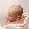 baby, blanket, calm, child, closeup, cute, ear, gentle, head, infant, newborn, peaceful, portrait, rest, skin, sleeping, soft, texture, warm, wrapped
