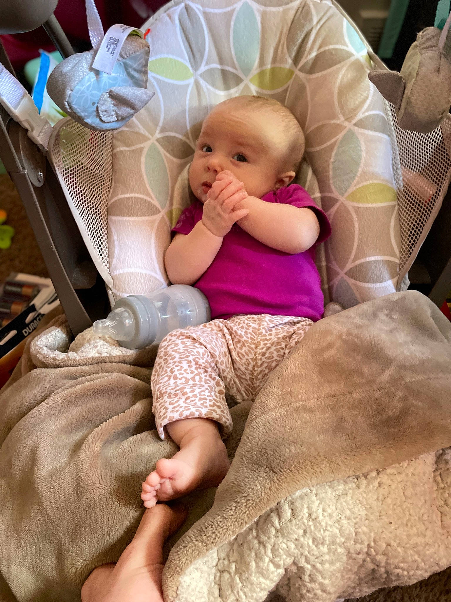 Harlow joined the competition — help win amazing prizes! baby, baby_carriage, baby_products, baby_toddler_clothing, child, comfort, foot, fun, human_body, human_leg, knee, lap, linens, mouth, person, pink, sitting, skin, thigh, toddler