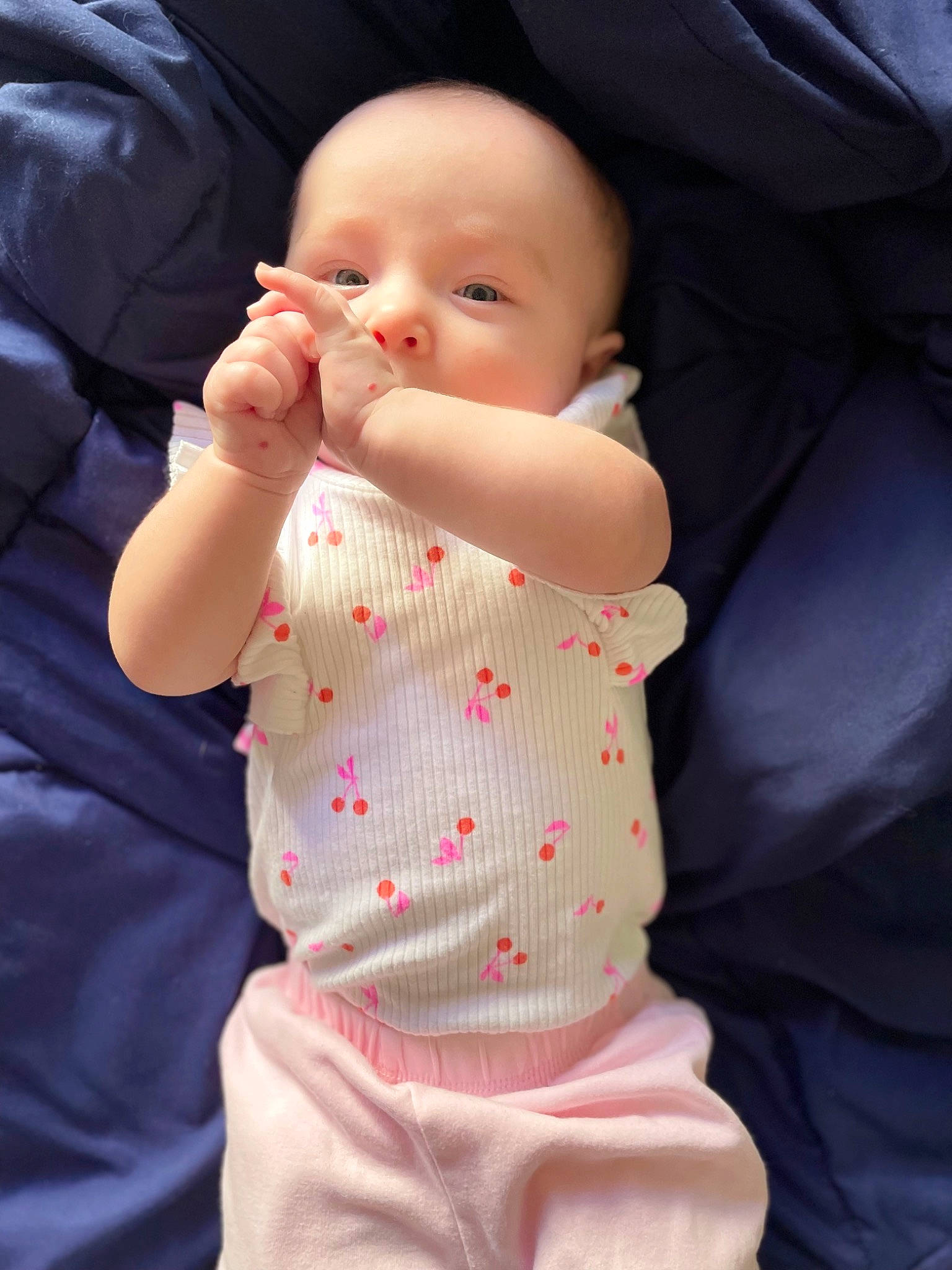 Harlow joined the competition — help win amazing prizes! arm, baby, baby_products, baby_sleeping, baby_toddler_clothing, cheek, child, collar, comfort, finger, gesture, hand, lip, mouth, nose, person, sitting, skin, sleeve, thumb