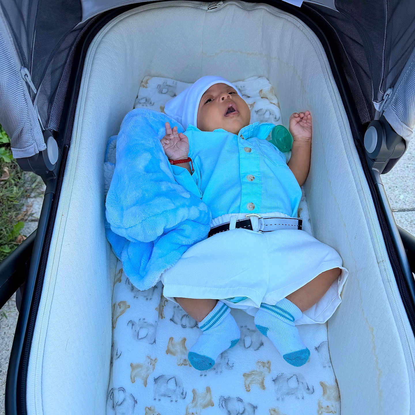 Mariangi joined the competition — help win amazing prizes! baby, infant, child, stroller, lying_down, blue_clothing, white_clothing, hat, blanket, socks, pacifier, outdoor, portrait, sleeping, awake, open_mouth, hands, bedding, fabric, family