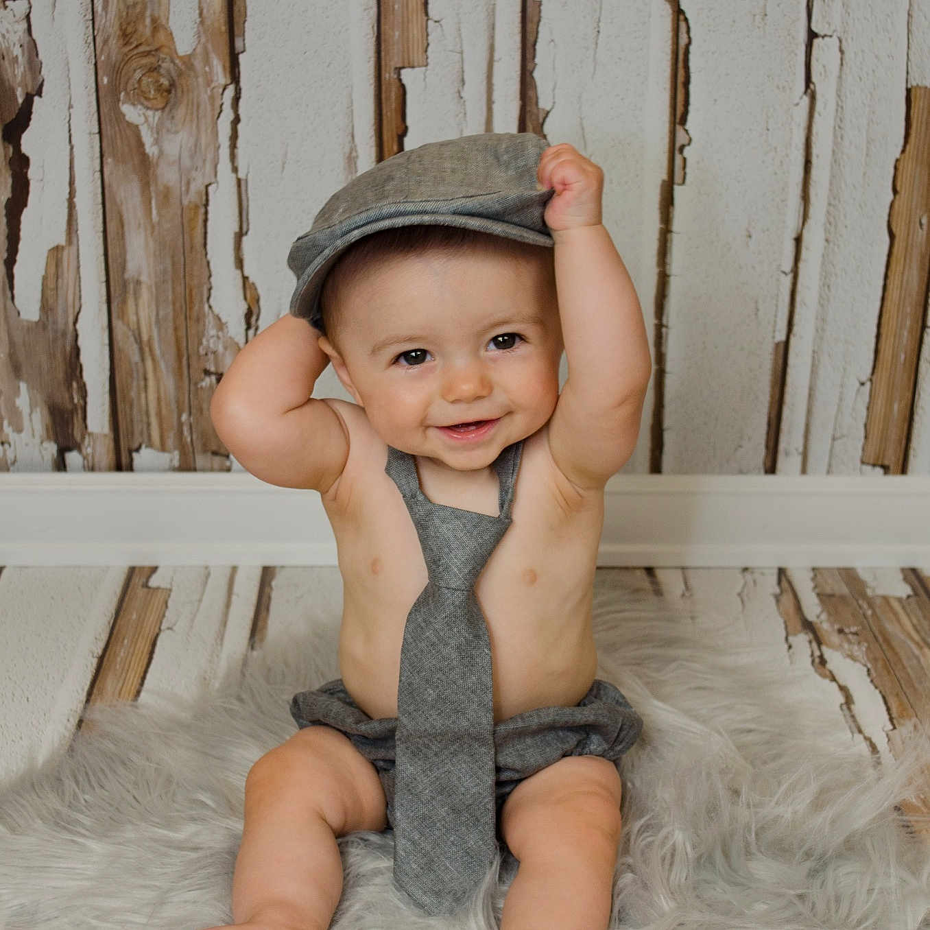 Teddy is registered to the contest to win money with this photo: boy, child, eye, finger, fun, girl, hand, infant, joy, leg, person, sitting, skin, toddler