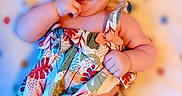 Amiyah joined the competition — help win amazing prizes! baby, baby_girl, cheeks, child, closeup, colorful_clothing, cute, floral_frame, hand_in_mouth, happy, headband, infant, lying_down, milestone, pink_bow, polka_dot_blanket, portrait, skin, smiling, text_overlay