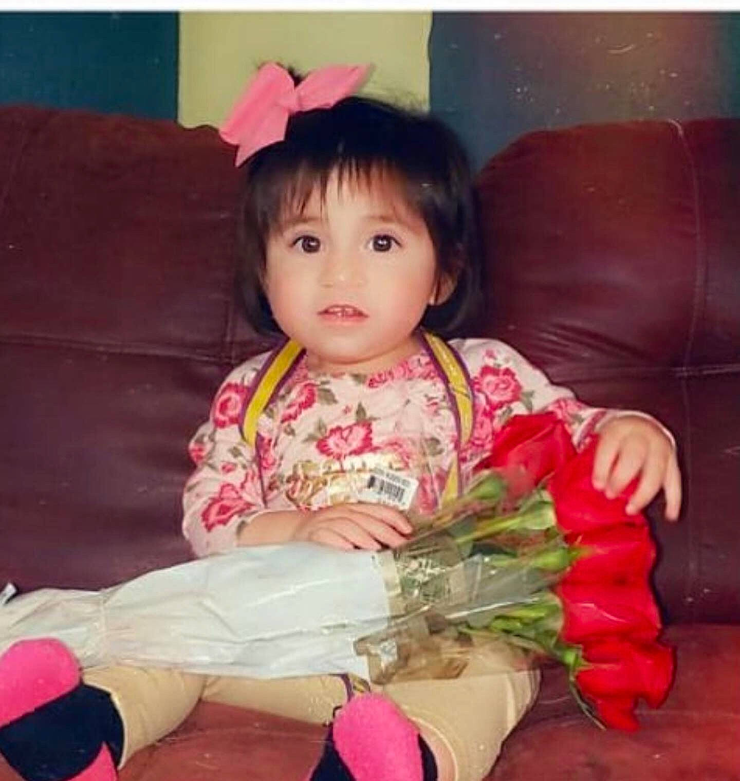 Averie is registered to the contest to win money with this photo: baby, black_hair, cheek, child, happy, person, pink, play, sitting, smile, toddler