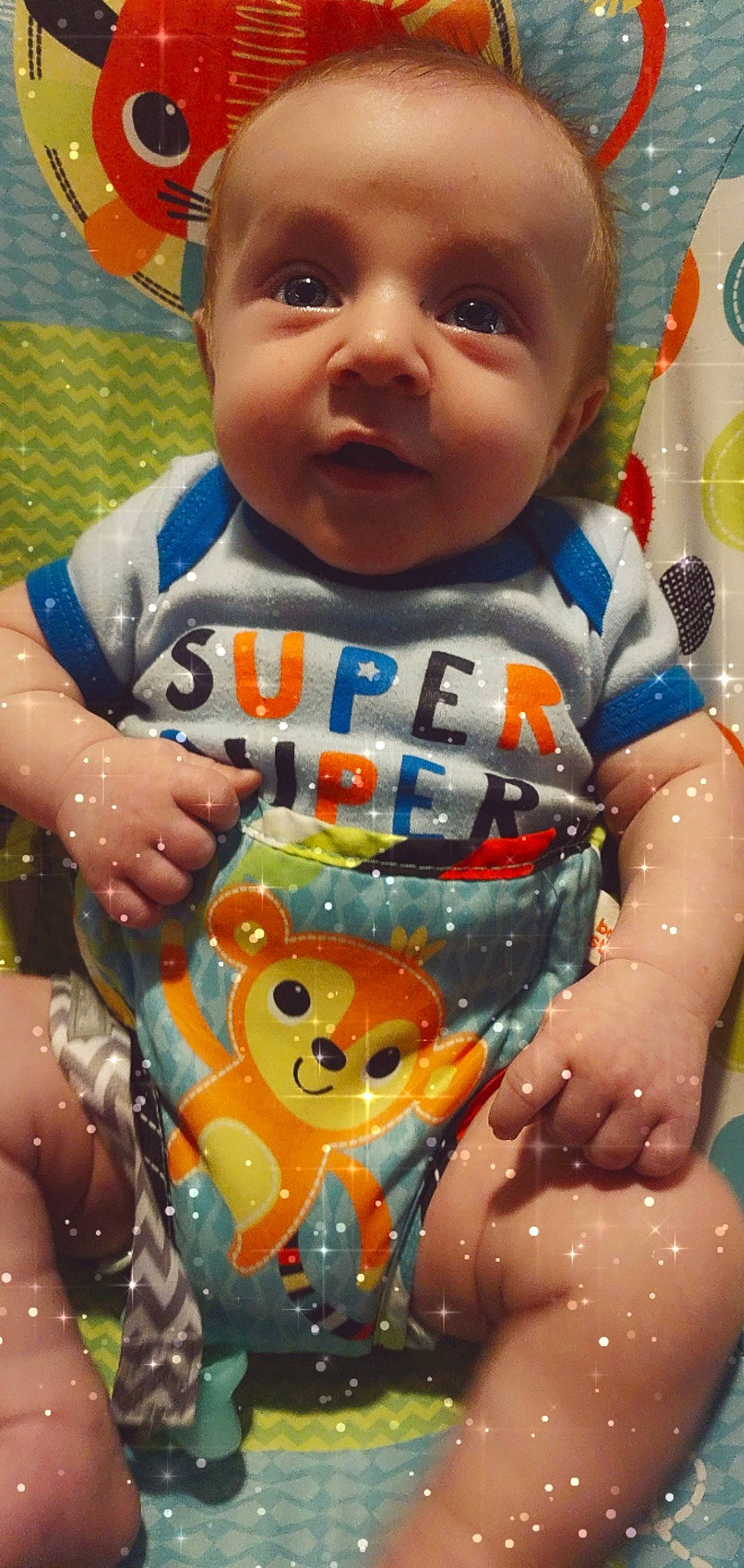 Corbin is registered to the contest to win money with this photo: baby_toddler_clothing, blue, cheek, chin, clothing, eye, face, facial_expression, hairstyle, head, human, human_body, mouth, nose, orange, organ, person, photograph, product, skin