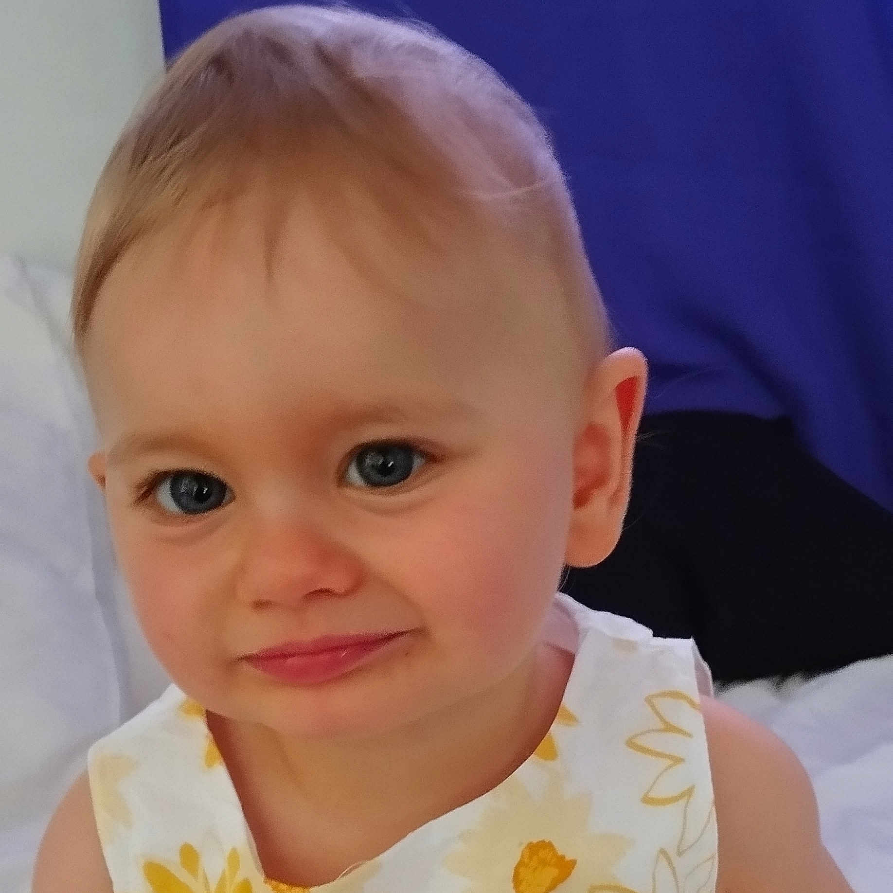 Thaëlya participe au concours pour gagner de l'argent avec cette photo : baby, blonde, bodypart, clothing, couch, dress, face, finger, frown, furniture, hair, hand, happy, head, newborn, person, photography, portrait, sad, smile