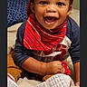 Trillion joined the competition — help win amazing prizes! toddler, child, smiling, red_cap, bandana, sitting, bed, happy, casual_clothing, footwear, indoor, portrait, cute, young_child, playful, person, face, eyes, hand, expression