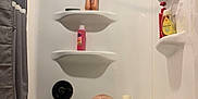 Bentley is registered to the contest to win money with this photo: baby, bathtub, bathroom, child, shower, towel, bottle, shelf, curtain, happy, smile, water, skin, head, hand, indoor, plumbing, fixture, person, playful