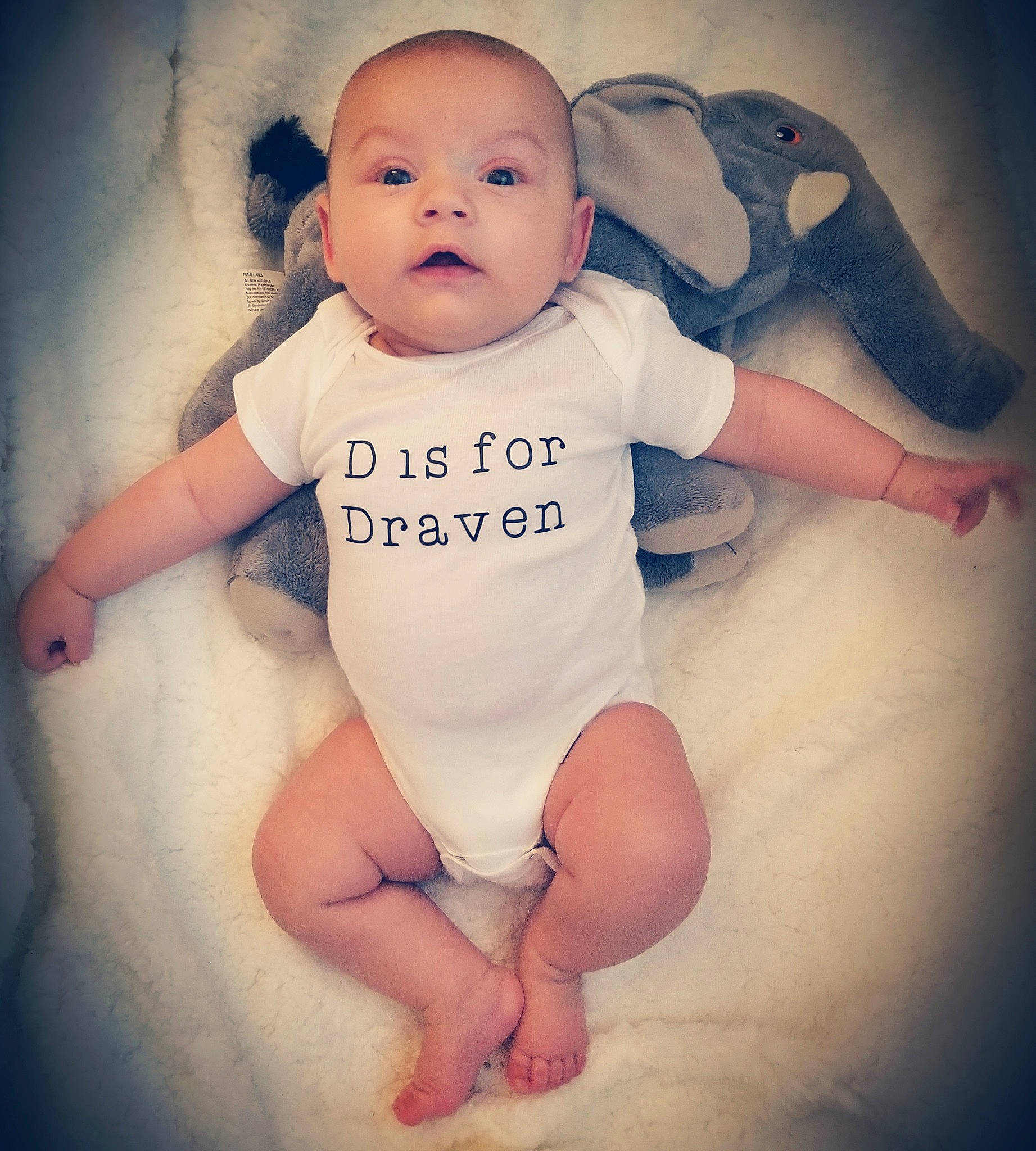 Draven is registered to the contest to win money with this photo: arm, baby, baby_making_funny_faces, baby_toddler_clothing, cheek, child, cool, eye, face, finger, fun, hand, head, leg, lip, nose, person, product, skin, stomach