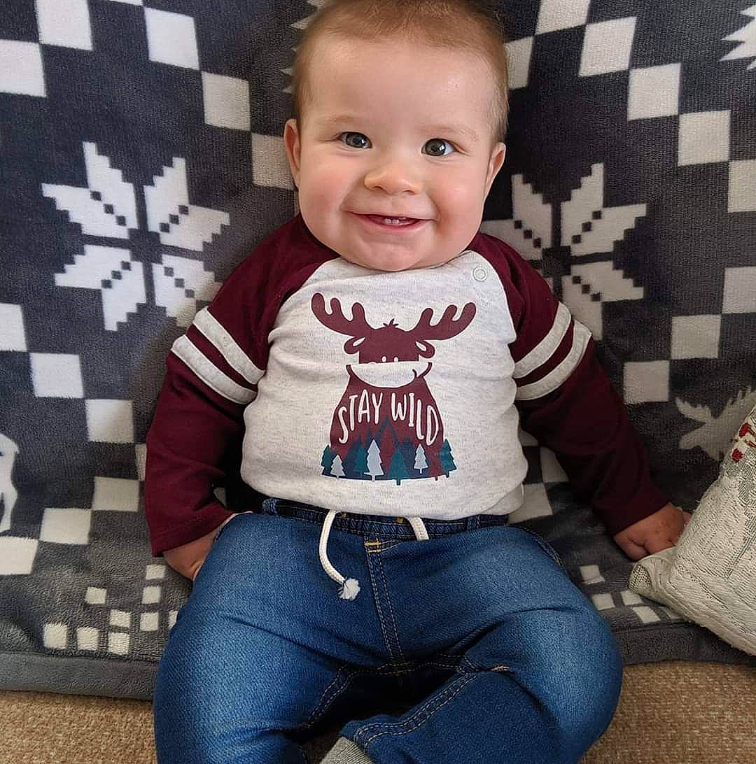 Kamden joined the competition — help win amazing prizes! baby, baby_toddler_clothing, cheek, child, cool, denim, face, footwear, head, jeans, joy, lip, male, outerwear, person, shoe, sitting, sleeve, smile, t_shirt