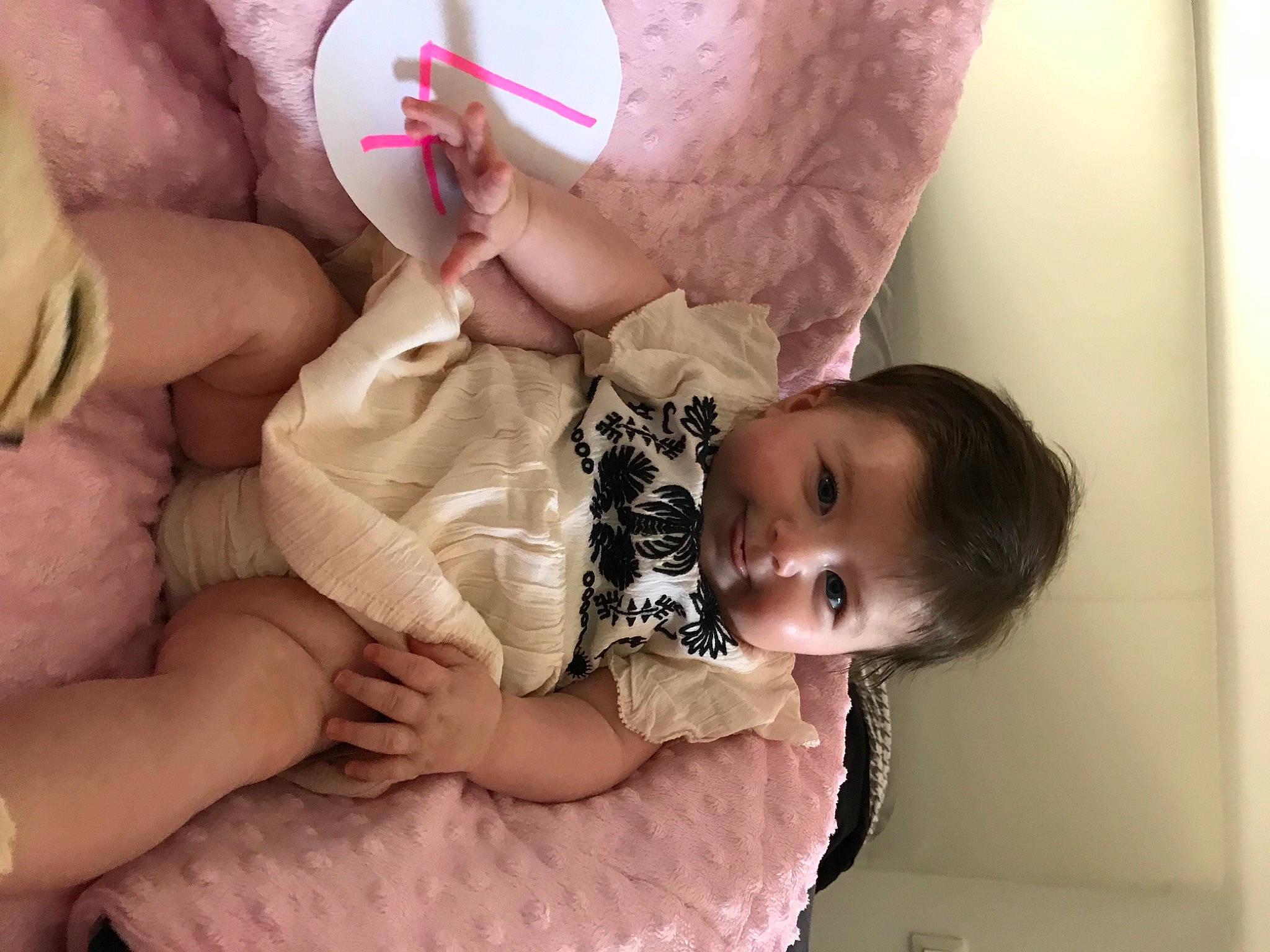 Romy participe au concours pour gagner de l'argent avec cette photo : arm, baby, baby_sleeping, baby_toddler_clothing, cheek, child, comfort, dress, eyelash, finger, hand, happy, human_body, lip, mouth, nail, pattern, person, pink, skin