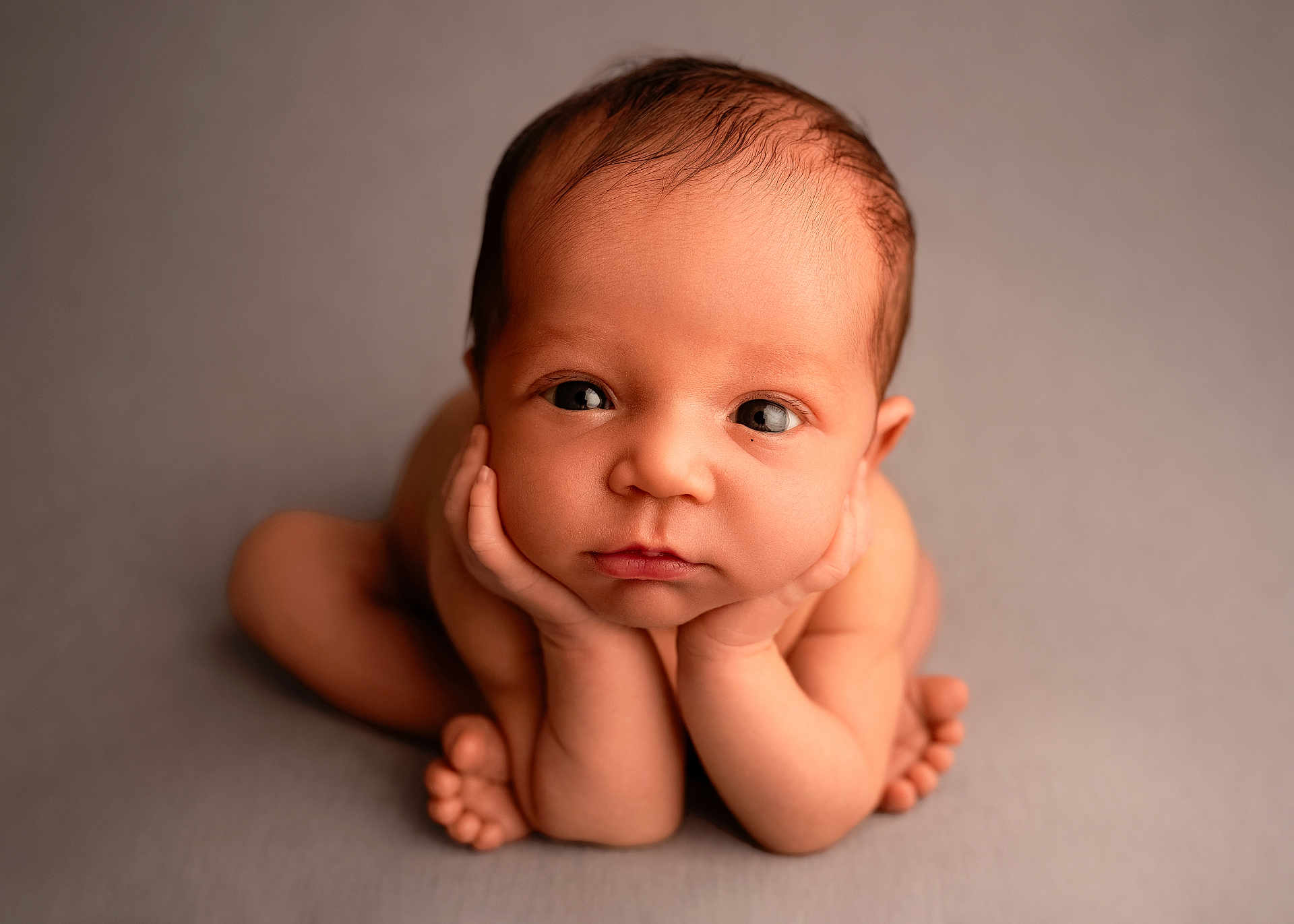 Kai is registered to the contest to win money with this photo: baby, infant, child, face, hands, feet, skin, portrait, cute, expression, eyes, newborn, resting, posing, soft_lighting, neutral_background, chubby_cheeks, curious, closeup, studio_photography