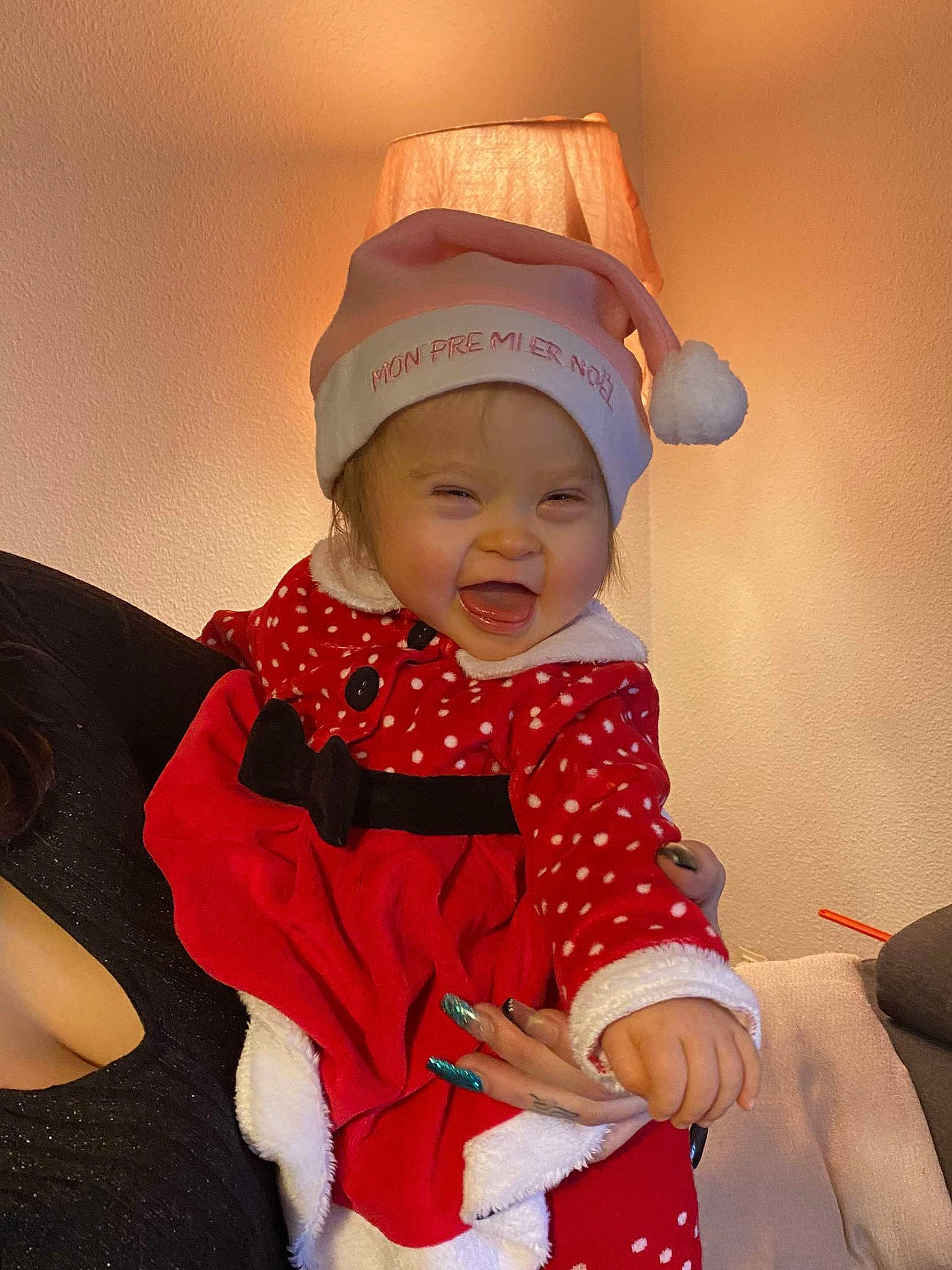 Ohana participe au concours pour gagner de l'argent avec cette photo : baby, baby_toddler_clothing, child, comfort, costume_hat, dress, event, face, fun, happy, hat, head, headgear, headwear, pattern, person, pink, sitting, skin, sleeve