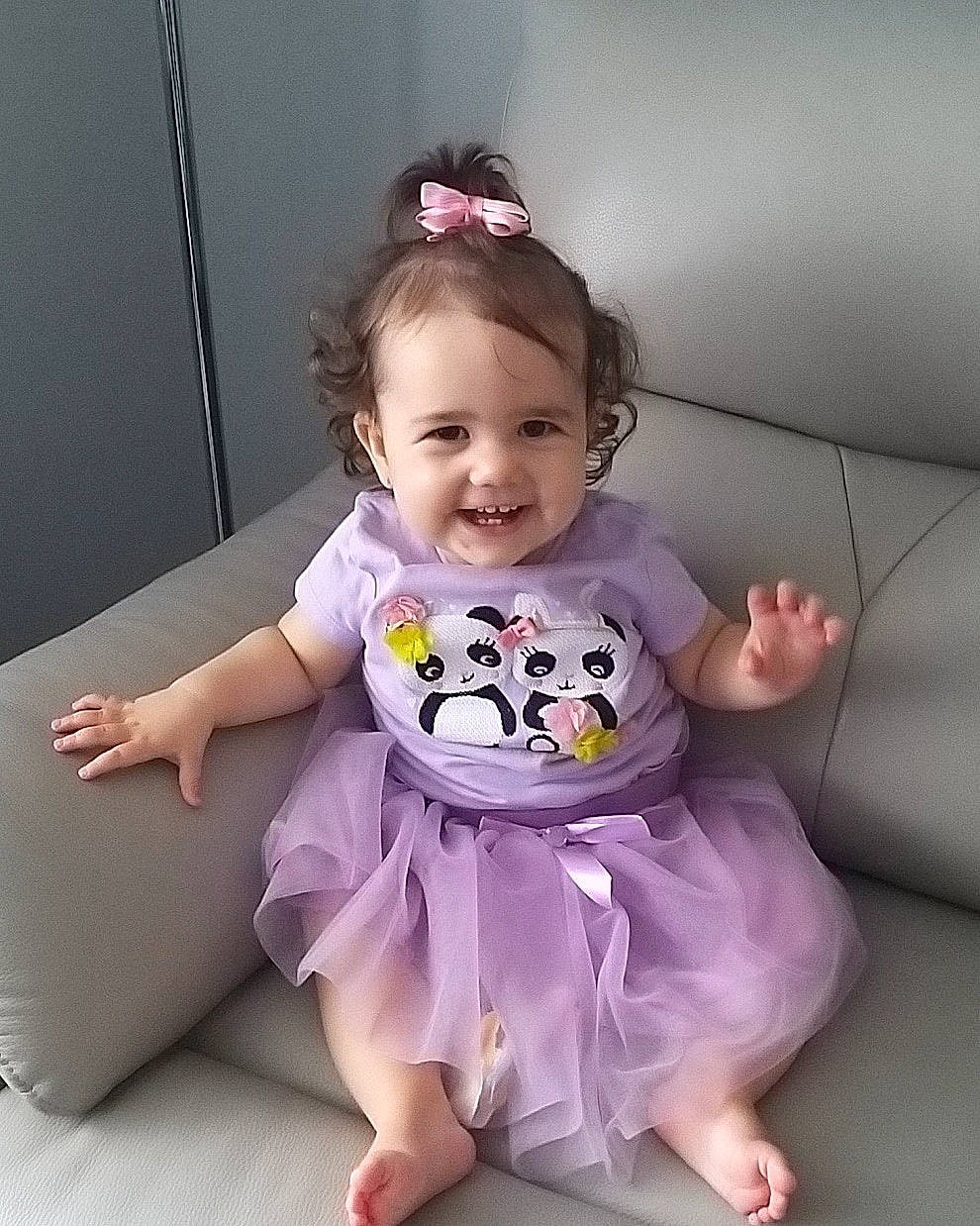 Amya is registered to the contest to win money with this photo: baby, baby_toddler_clothing, child, clothing, costume, dress, hair_accessory, joy, lavender, lilac, person, pink, purple, sitting, sleeve, toddler