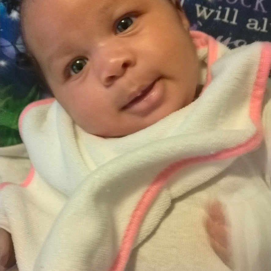 Emmaly joined the competition — help win amazing prizes! baby, bed, blanket, bonnet, clothing, crib, cushion, face, furniture, hat, head, homedecor, infantbed, linen, newborn, person, photography, portrait, quilt, towel