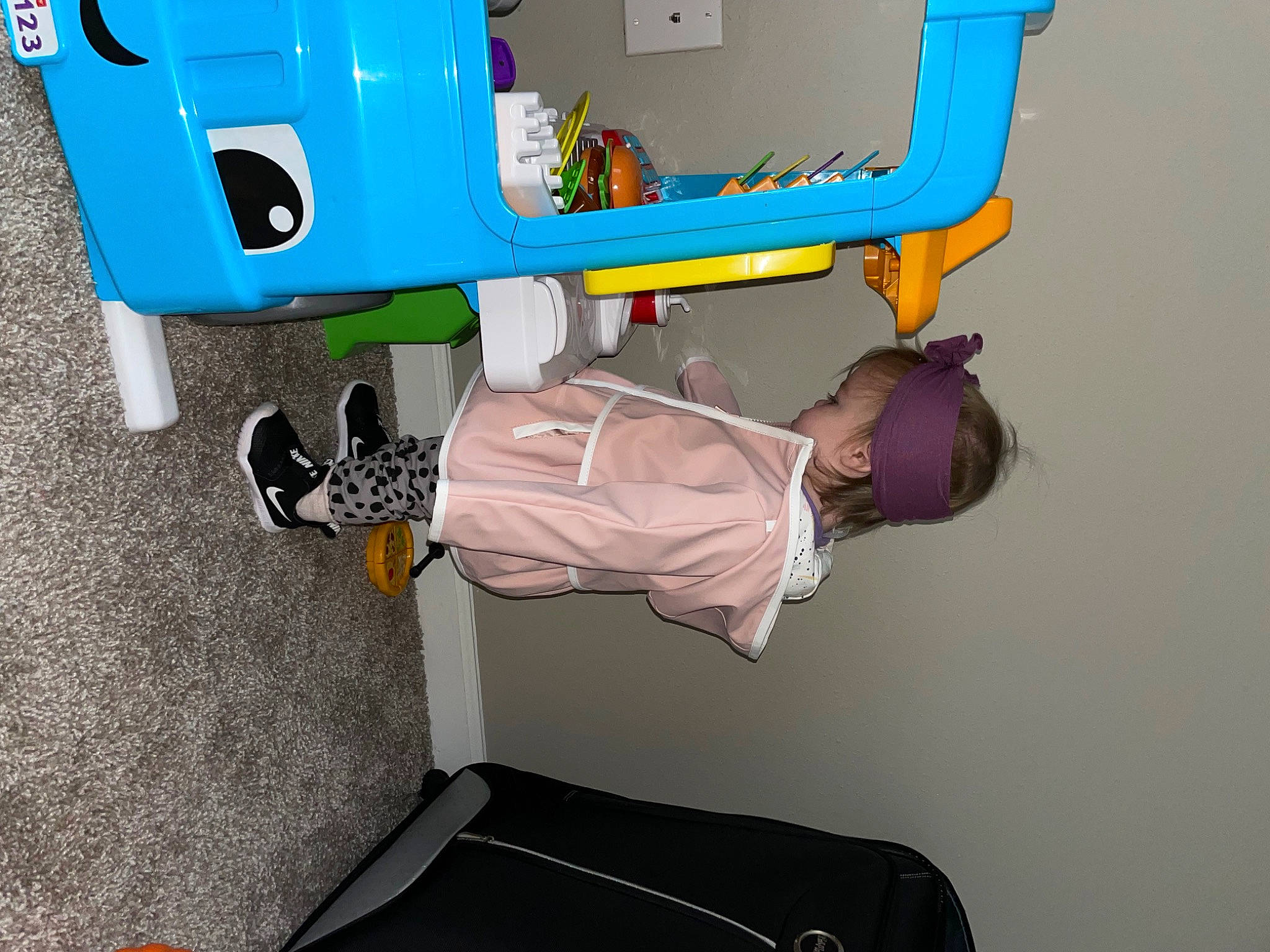 Ellie joined the competition — help win amazing prizes! automotive_exterior, baby, baby_products, baby_toys, blue, bumper, child, electric_blue, fun, leisure, machine, motor_vehicle, person, photography, play, room, t_shirt, tire, toddler, vehicle_door