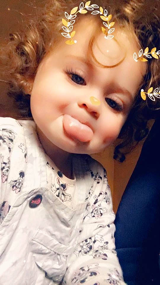 Ilyana participe au concours pour gagner de l'argent avec cette photo : brown_hair, cheek, child, doll, eye, eyebrow, eyelash, face, forehead, girl, hair_accessory, head, headpiece, human_hair_color, infant, iris, lip, person, skin, smile