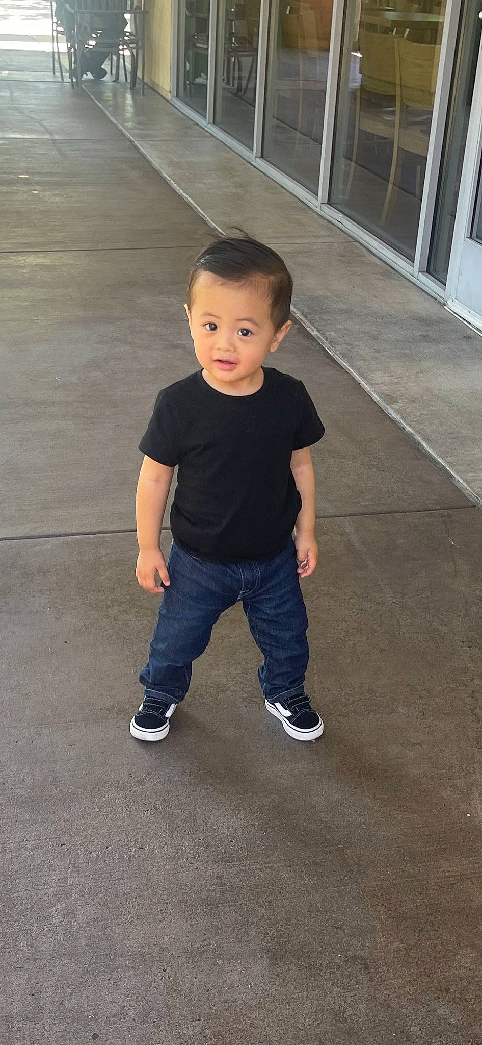 Royce is registered to the contest to win money with this photo: asphalt, baby_toddler_clothing, child, concrete, electric_blue, eye, face, floor, flooring, fun, happy, hardwood, human_leg, leg, person, road_surface, sleeve, t_shirt, toddler, waist