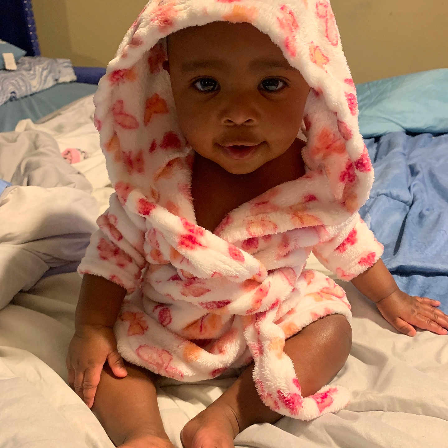 Carmen joined the competition — help win amazing prizes! baby, bed, bedroom, blanket, bonnet, clothing, face, furniture, happy, hat, head, hood, indoors, person, photography, portrait, quilt, room, smile, towel