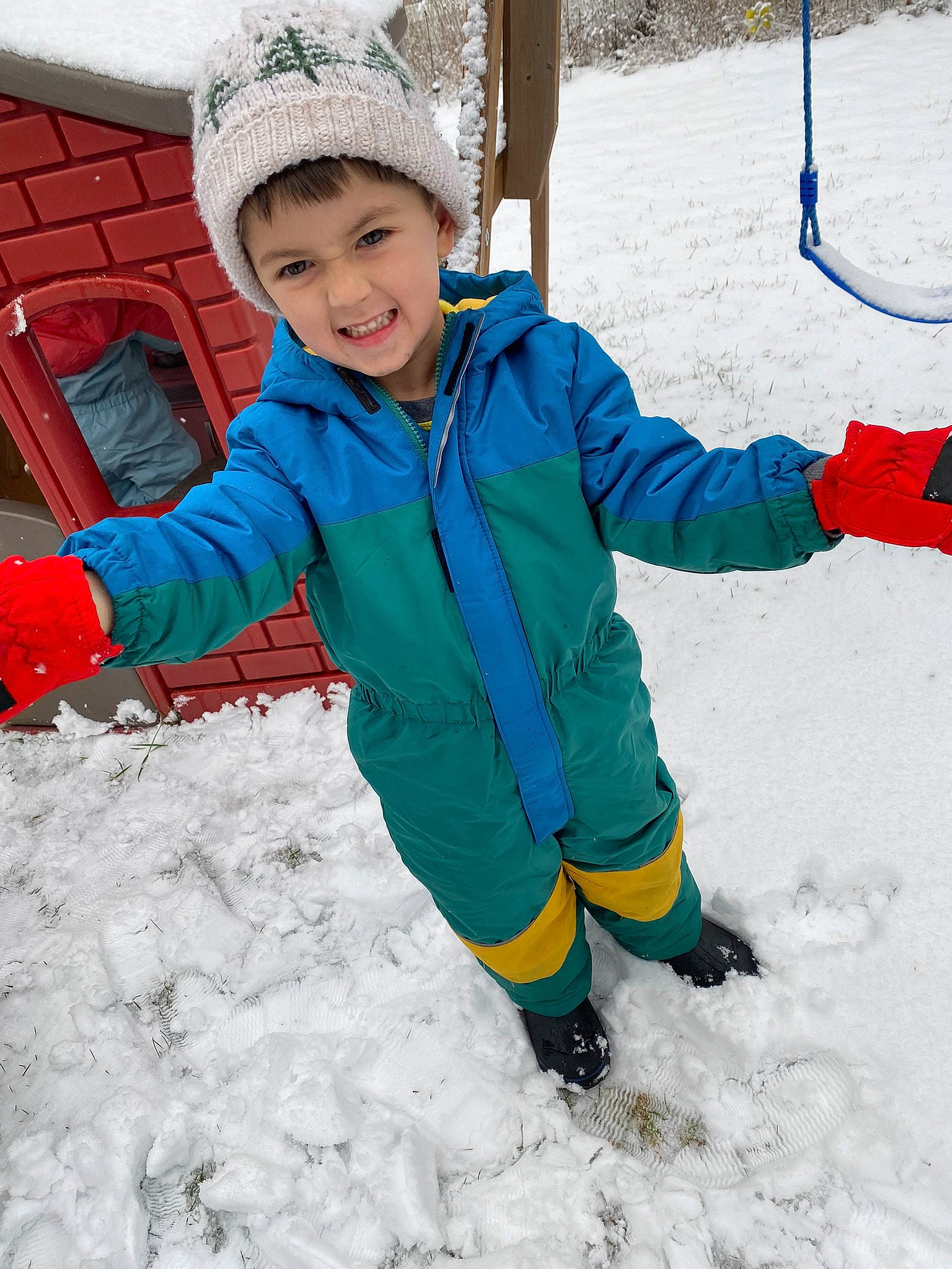 Kayson is registered to the contest to win money with this photo: baby_toddler_clothing, child, electric_blue, face, freezing, fun, glove, happy, headwear, jacket, joy, leisure, people_in_nature, person, play, playing_in_the_snow, recreation, slope, smile, snow