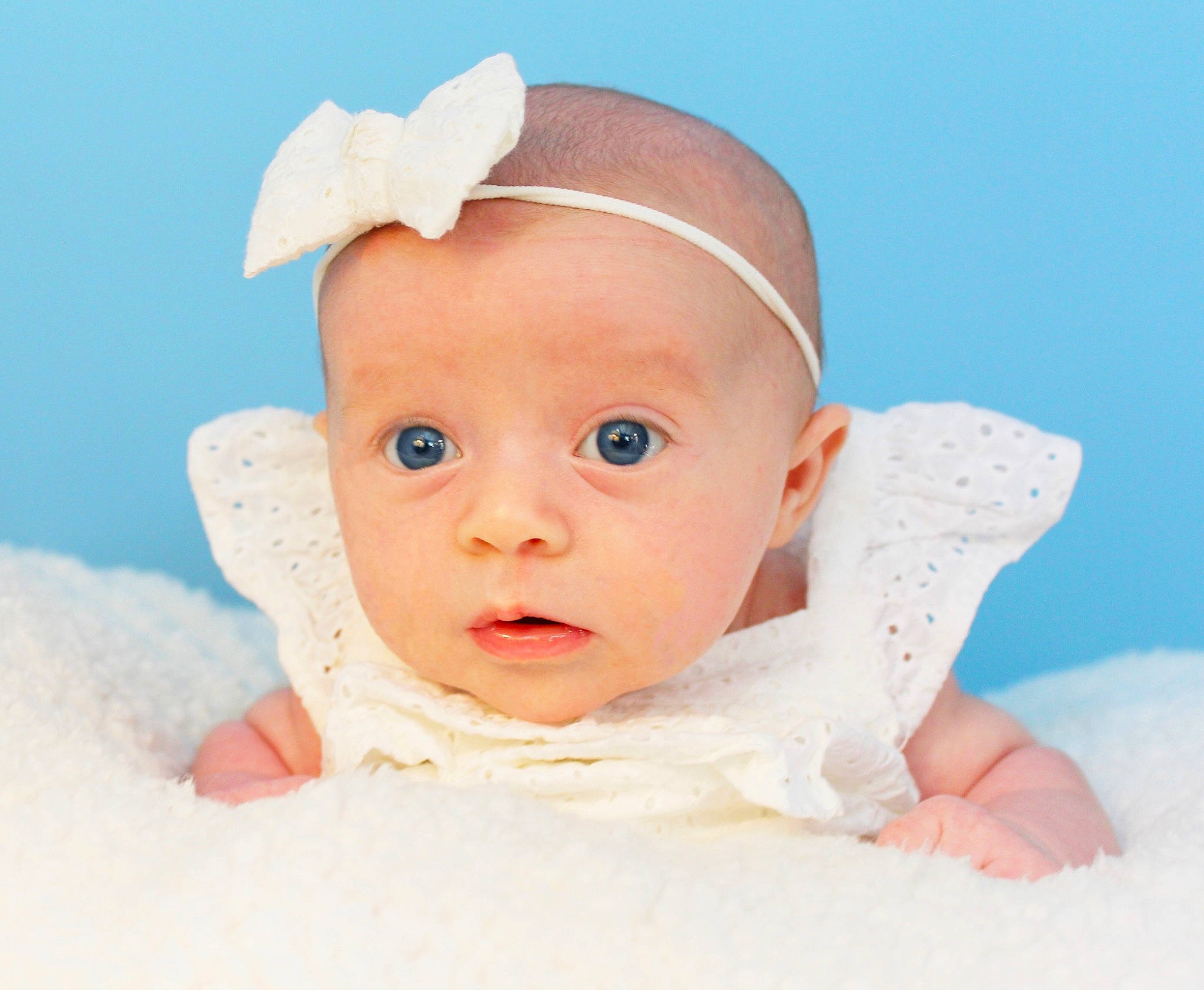 Tinley is registered to the contest to win money with this photo: baby, baby_making_funny_faces, cheek, child, ear, eye, face, fashion_accessory, forehead, hair_accessory, head, headband, headgear, lip, organ, person, photography, pink, skin, toddler