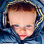 Noé participe au concours pour gagner de l'argent avec cette photo : baby, child, face, blue_eyes, hood, jacket, smile, close_up, portrait, warm_clothing, cute, infant, young_child, zipped_jacket, outdoor_wear, childrens_fashion, red_hair, baby_face, happy, person