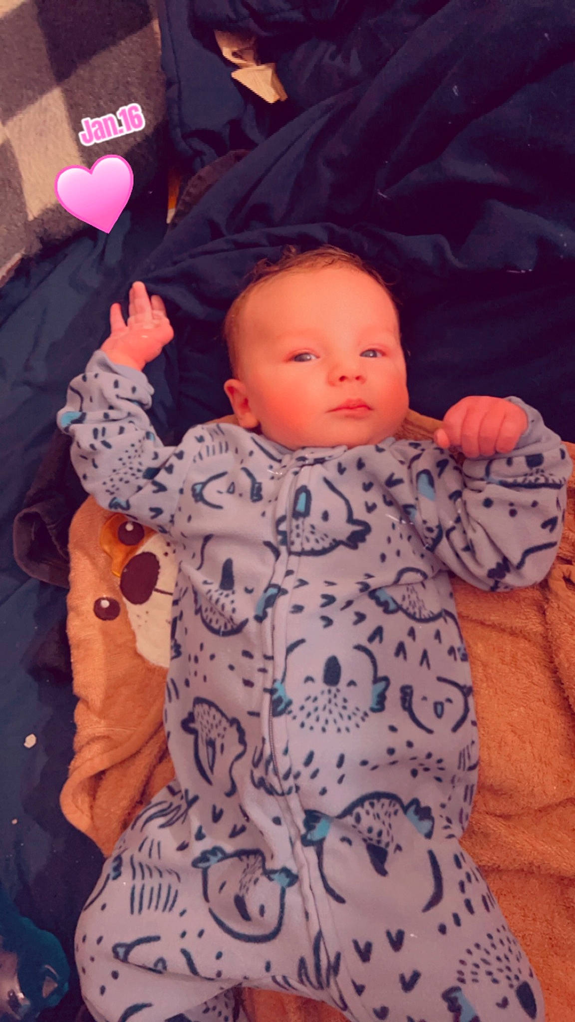 Colton joined the competition — help win amazing prizes! baby, baby_products, baby_toddler_clothing, cheek, child, comfort, facial_expression, finger, linens, mammal, orange, outerwear, pattern, person, pink, product, sitting, skin, sleeve, textile