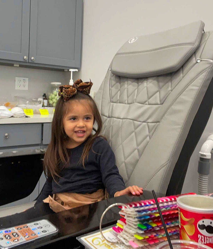 Brynleigh joined the competition — help win amazing prizes! chair, child, cooking, countertop, desk, event, flooring, fun, home_appliance, indoor_games_and_sports, joy, kitchen, leisure, office_equipment, person, plastic, recreation, room, smile, t_shirt