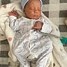 newborn, baby, sleeping, blanket, onesie, hat, pacifier, indoor, soft, cozy, infant, child, cute, resting, peaceful, face, hand, footed_pajamas, plush, carpet