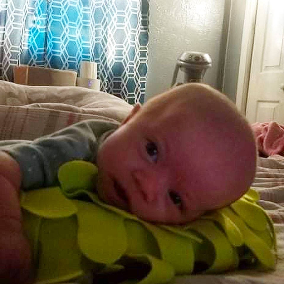 Ivory is registered to the contest to win money with this photo: baby, baby_products, baby_safety, baby_toddler_clothing, bedding, bedtime, cheek, child, comfort, couch, eye, flooring, linens, nose, person, pillow, room, thumb, toddler, tummy_time